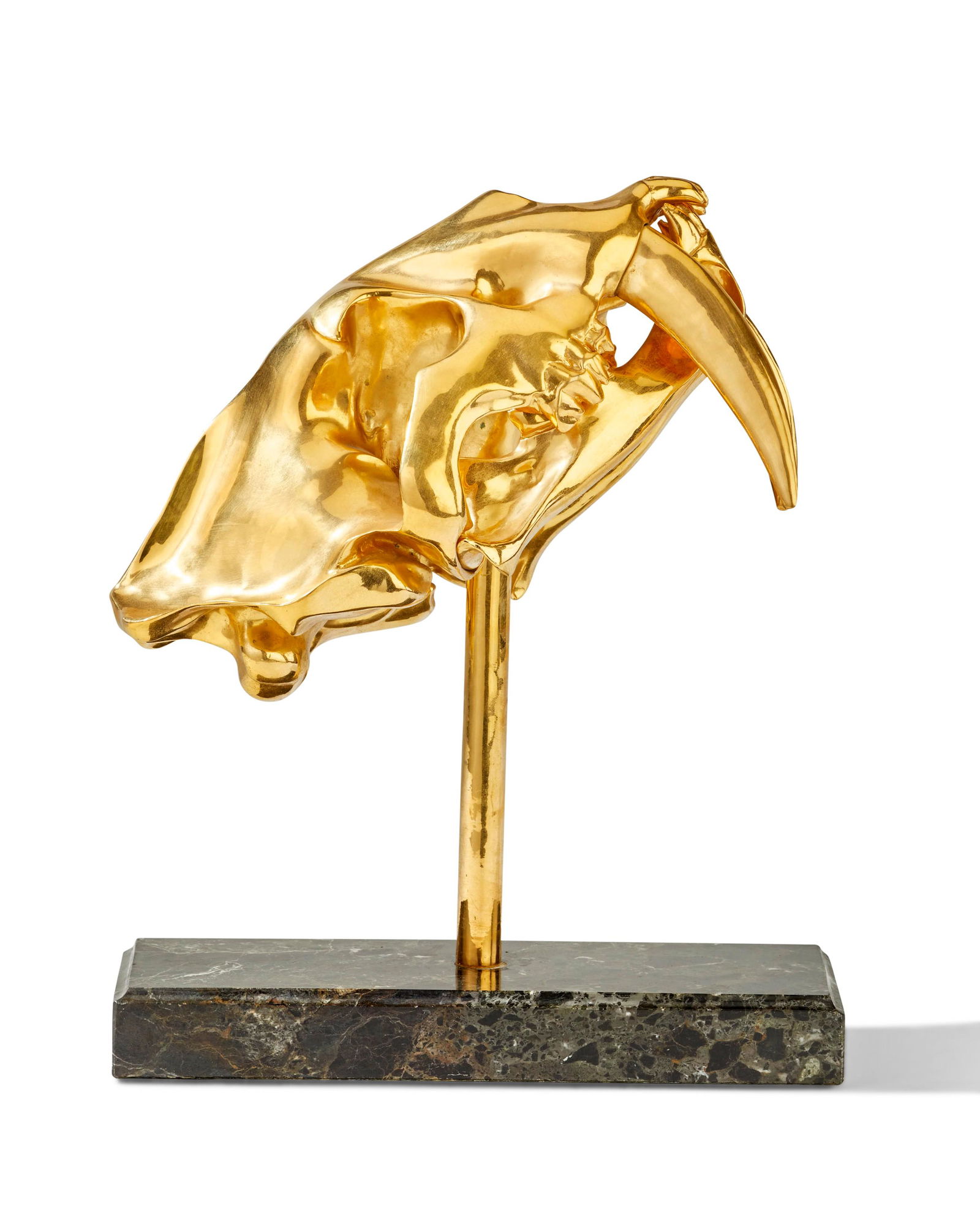 A brass sabretooth tiger skull sculpture (1 of 3)