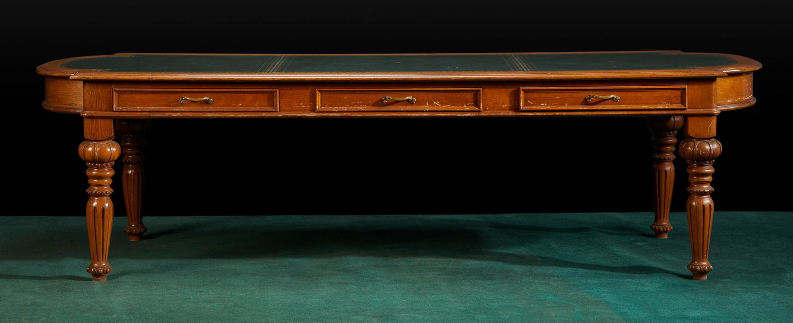 An American Victorian Renaissance Revival library table (1 of 5)