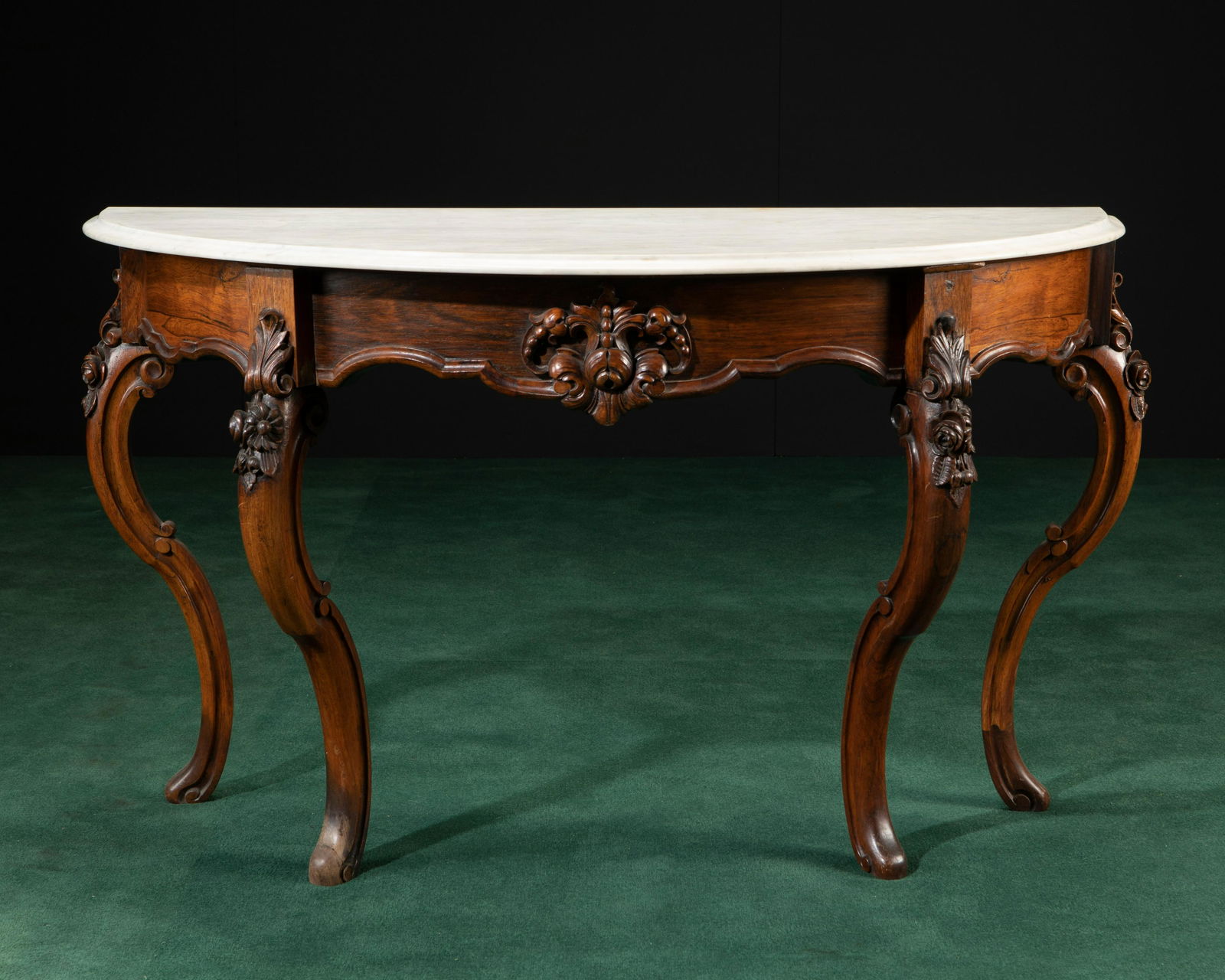 A Victorian Rococo Revival demi-lune table (1 of 3)