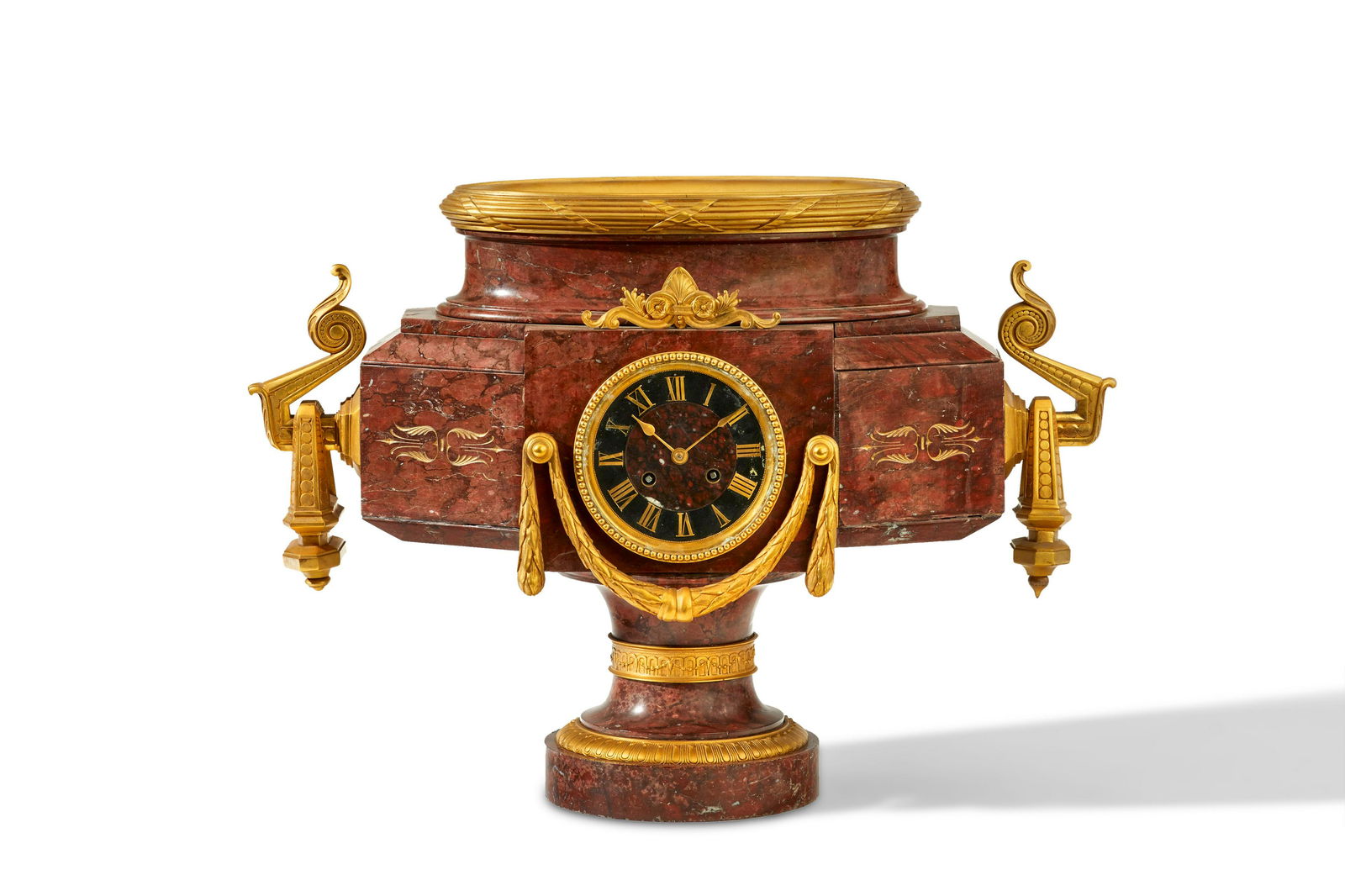 A rouge marble and bronze mantle clock (1 of 5)