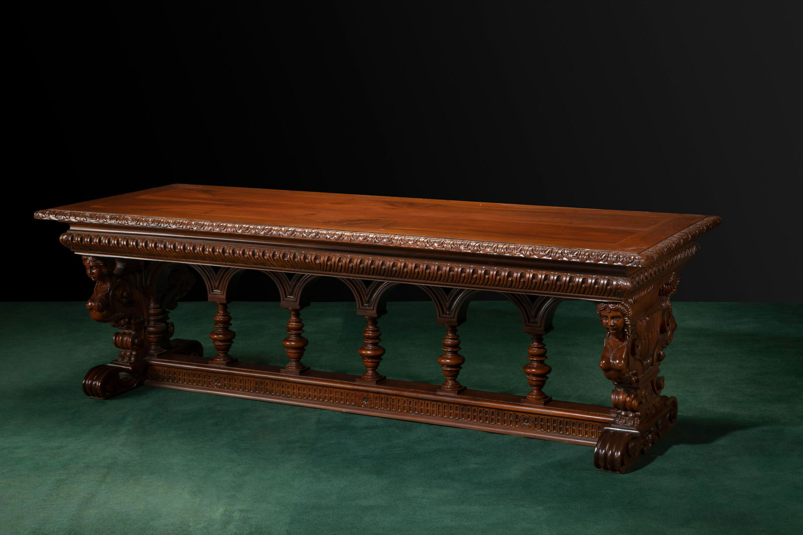 An Italian carved walnut library table (1 of 3)