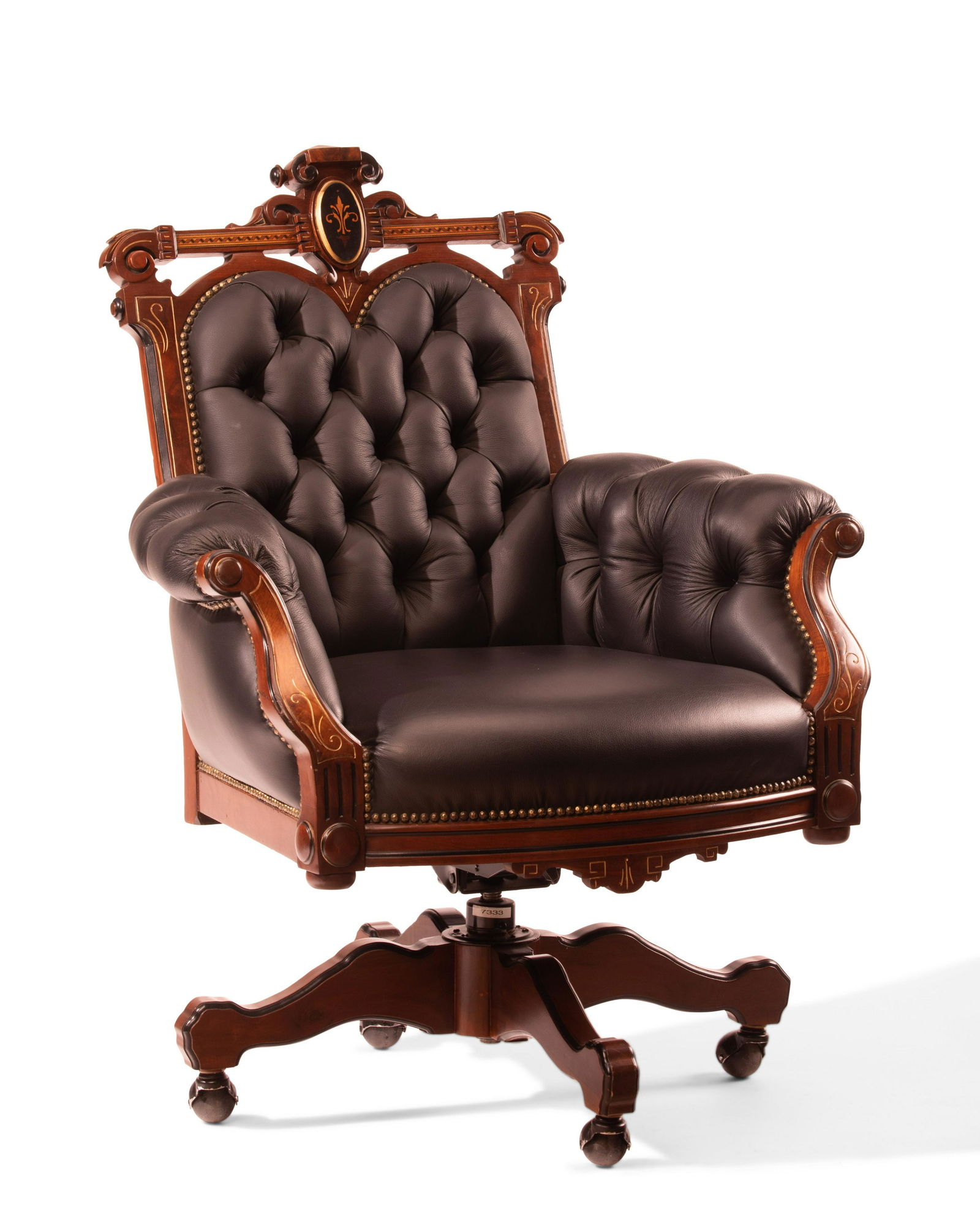 An Eastlake Victorian-style executive swivel chair (1 of 5)