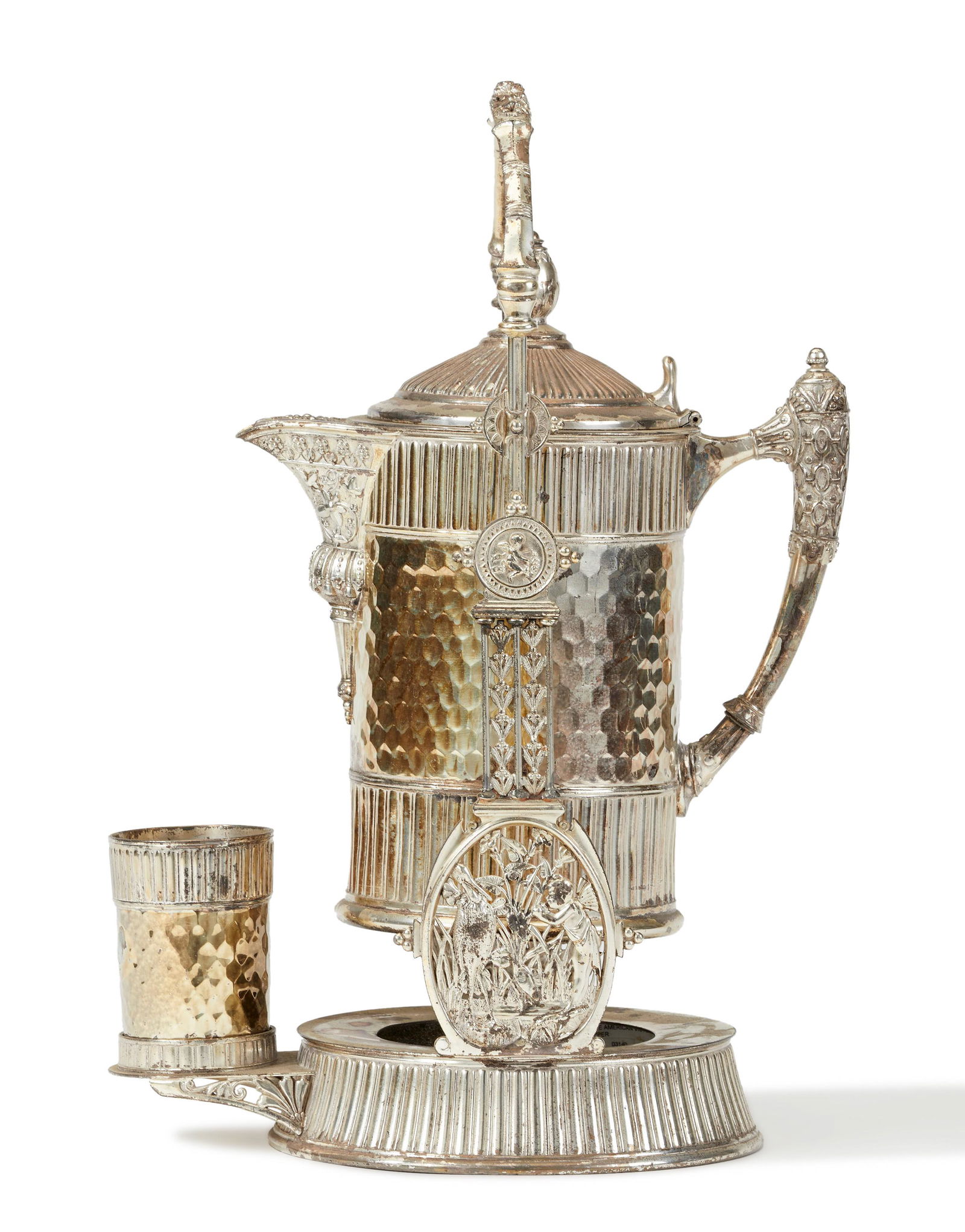 A Victorian silver-plated tipping server (1 of 5)