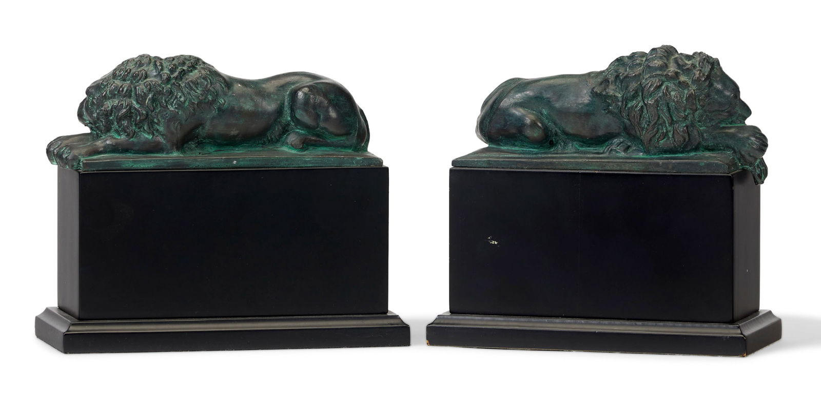 A near-pair of bronze lion bookends (1 of 4)