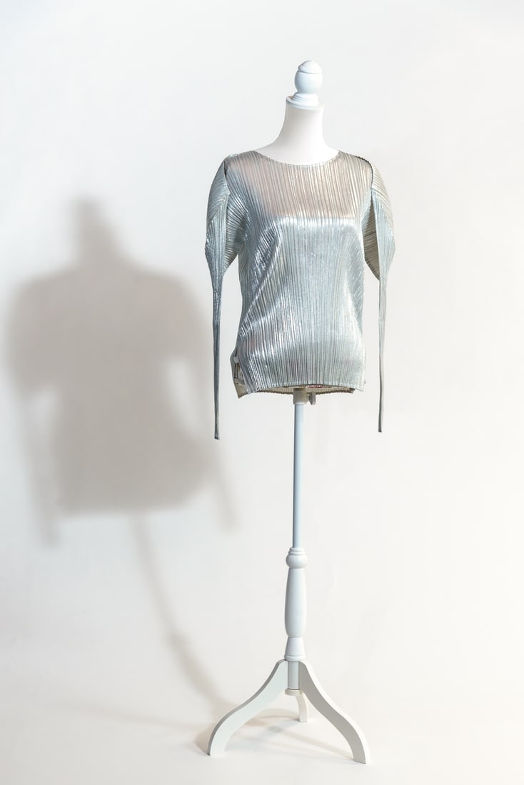 Issey Miyake - Silver Long-sleeved Shirt, 'Pleats Please Collaboration - Guest Artist Series No. 3: Issey Miyake - Silver Long-sleeved Shirt, 'Pleats Please Collaboration - Guest Artist Series No. 3 (Tim Hawkinson)' Date: 1998 Dimensions: One Size Condition: Excellent Condition2 Pairs (Please see te