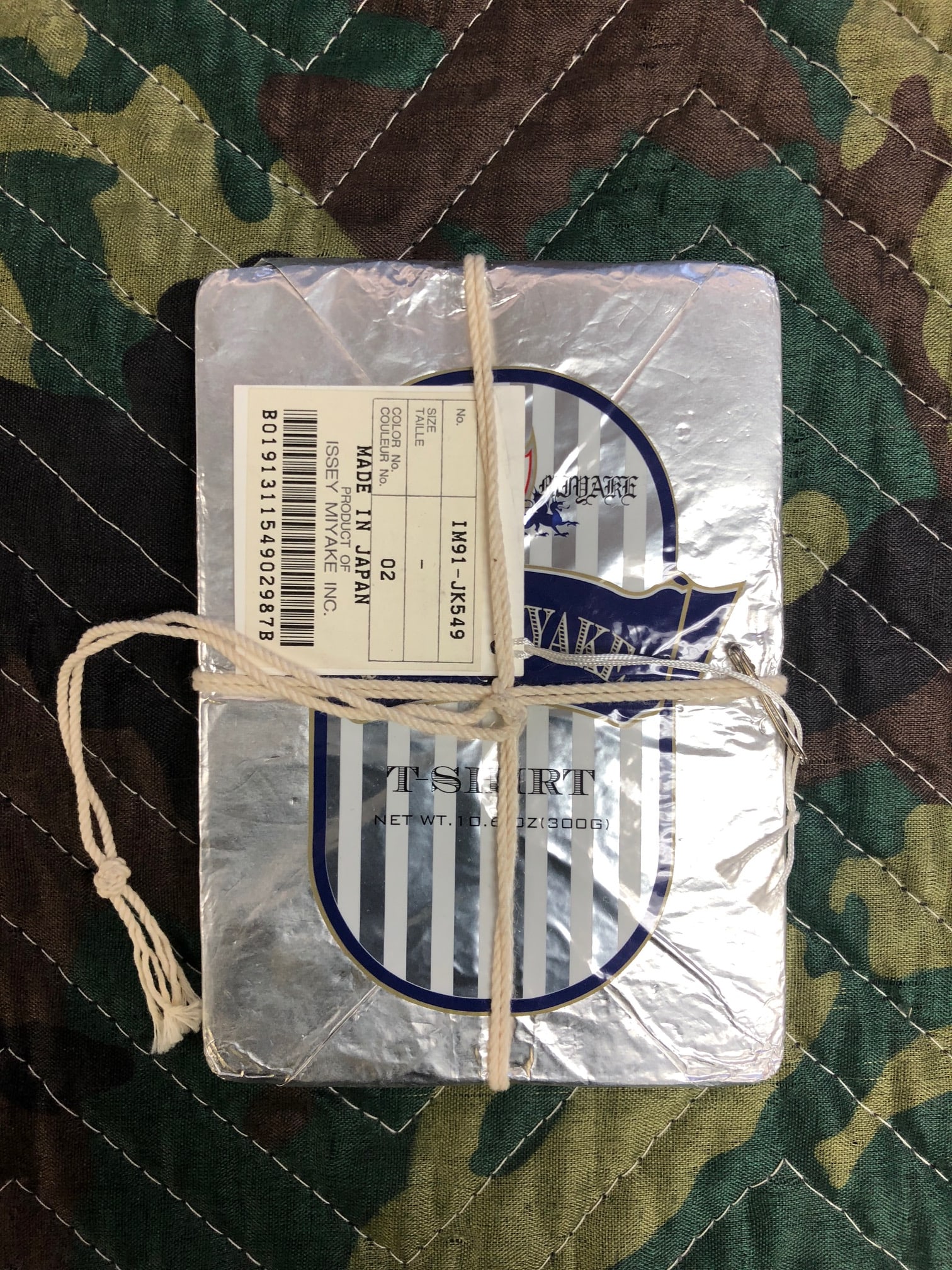 Issey Miyake - Crushed T-Shirt, 'Pleats Please Collaboration - Guest Artist Series No. 3 (Tim: Issey Miyake - Crushed T-Shirt, 'Pleats Please Collaboration - Guest Artist Series No. 3 (Tim Hawkinson)' Date: 1998 Dimensions: One Size Condition: Artwork in very good condition (Please see terms &