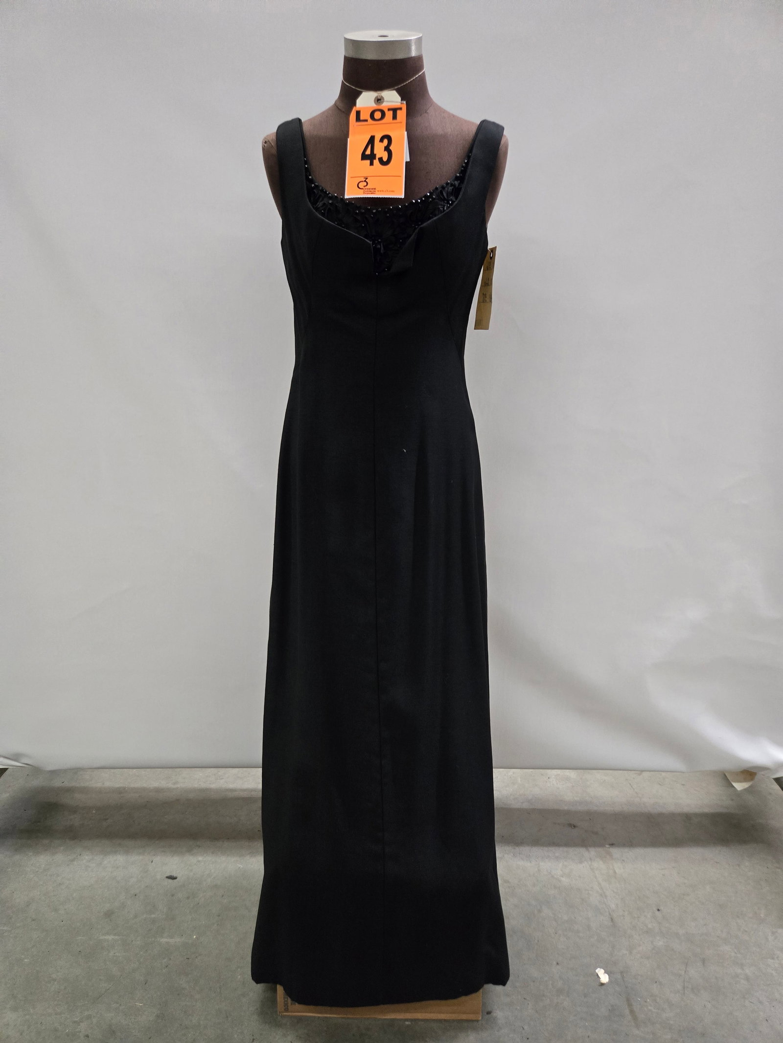Evening gown, 1960s, black wool, sleeveless with ribbon work at neck, n/a. (1 of 4)
