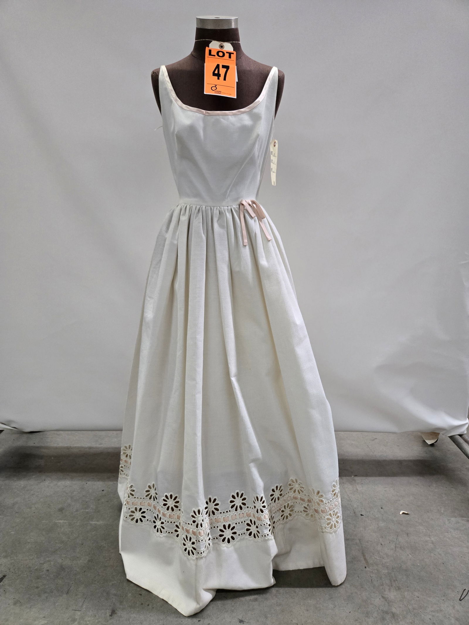 Evening gown, 1960s, white piqué with baby-pink satin trim, by Magnin. (1 of 7)