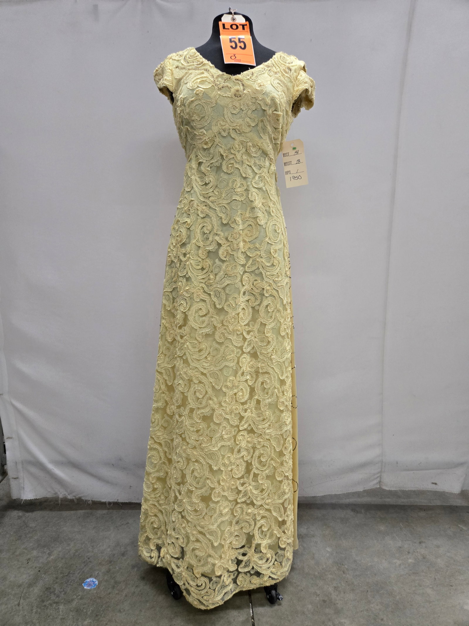 Evening gown, 1950s, yellow embroidered lace and satin, beaded detail, scoop neck, n/a.: Evening gown, 1950s, yellow embroidered lace and satin, beaded detail, scoop neck, n/a. IMPORTANT NOTE TO BIDDERS: We are not an auction gallery but a liquidator retained by CRC as they wind-down oper