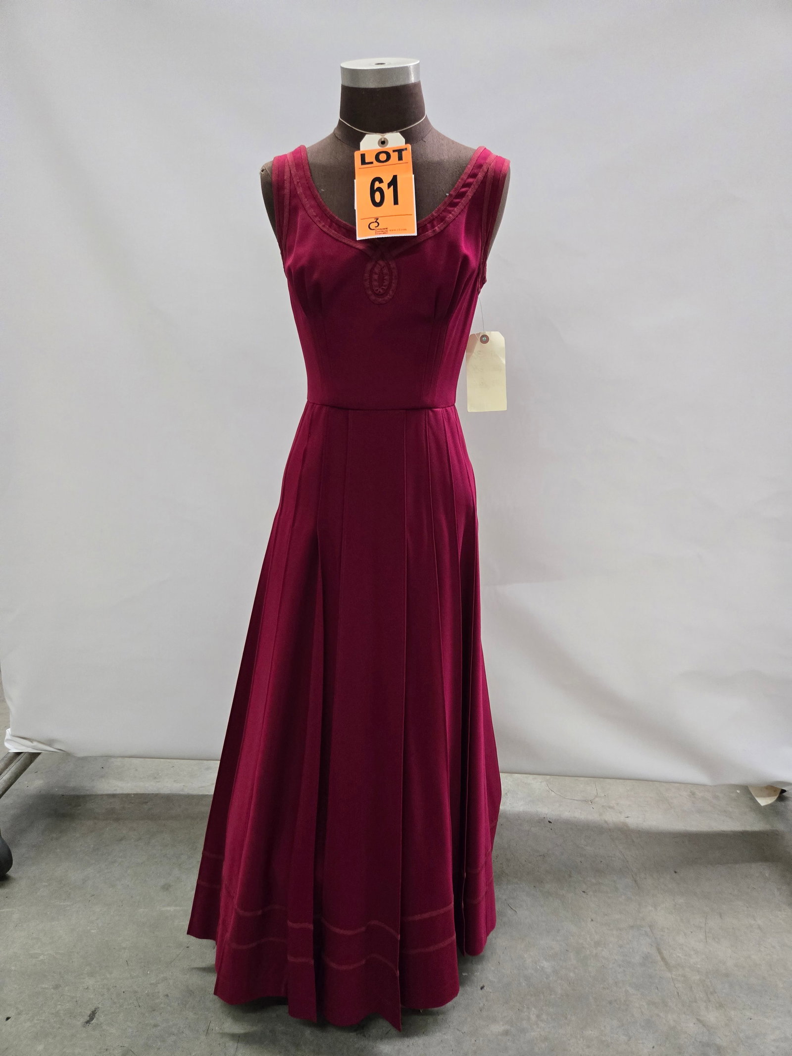 Evening gown, 1950s, cranberry wool crepe, pintucked skirt with middy-grey trim.: Evening gown, 1950s, cranberry wool crepe, pintucked skirt with middy-grey trim. IMPORTANT NOTE TO BIDDERS: We are not an auction gallery but a liquidator retained by CRC as they wind-down operations.