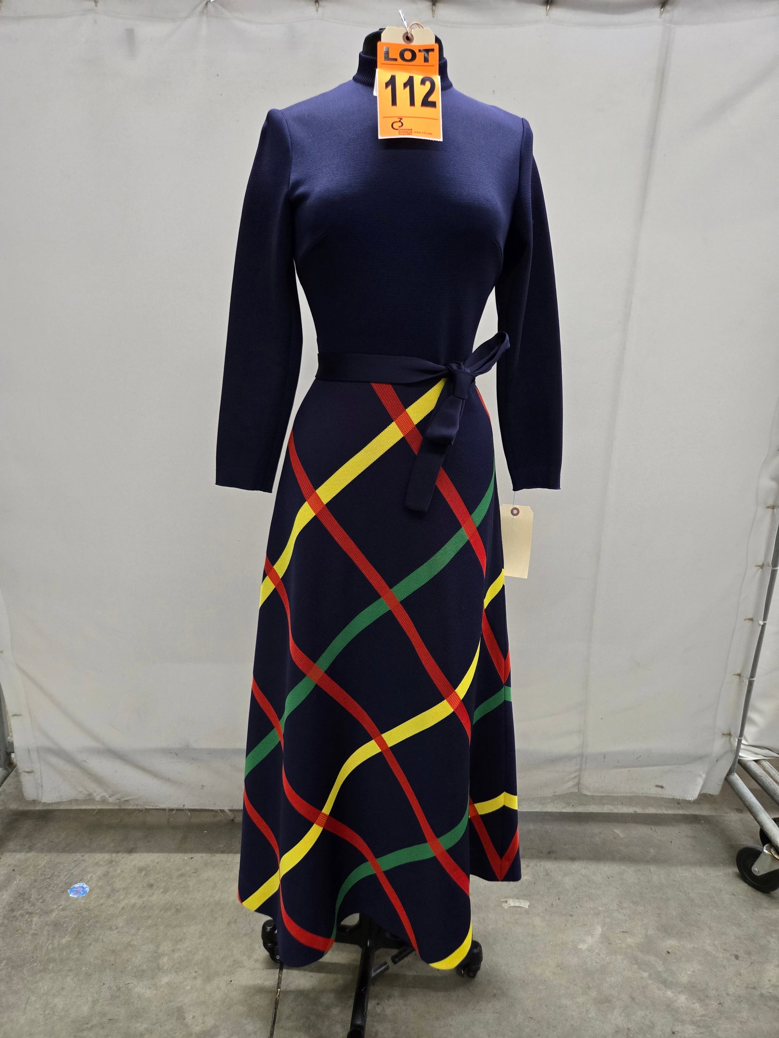 Evening gown set, 1960s, navy knit bodice/belt with red/yellow/green large-plaid skirt, by Sebastian: Evening gown set, 1960s, navy knit bodice/belt with red/yellow/green large-plaid skirt, by Sebastian. IMPORTANT NOTE TO BIDDERS: We are not an auction gallery but a liquidator retained by CRC as they 