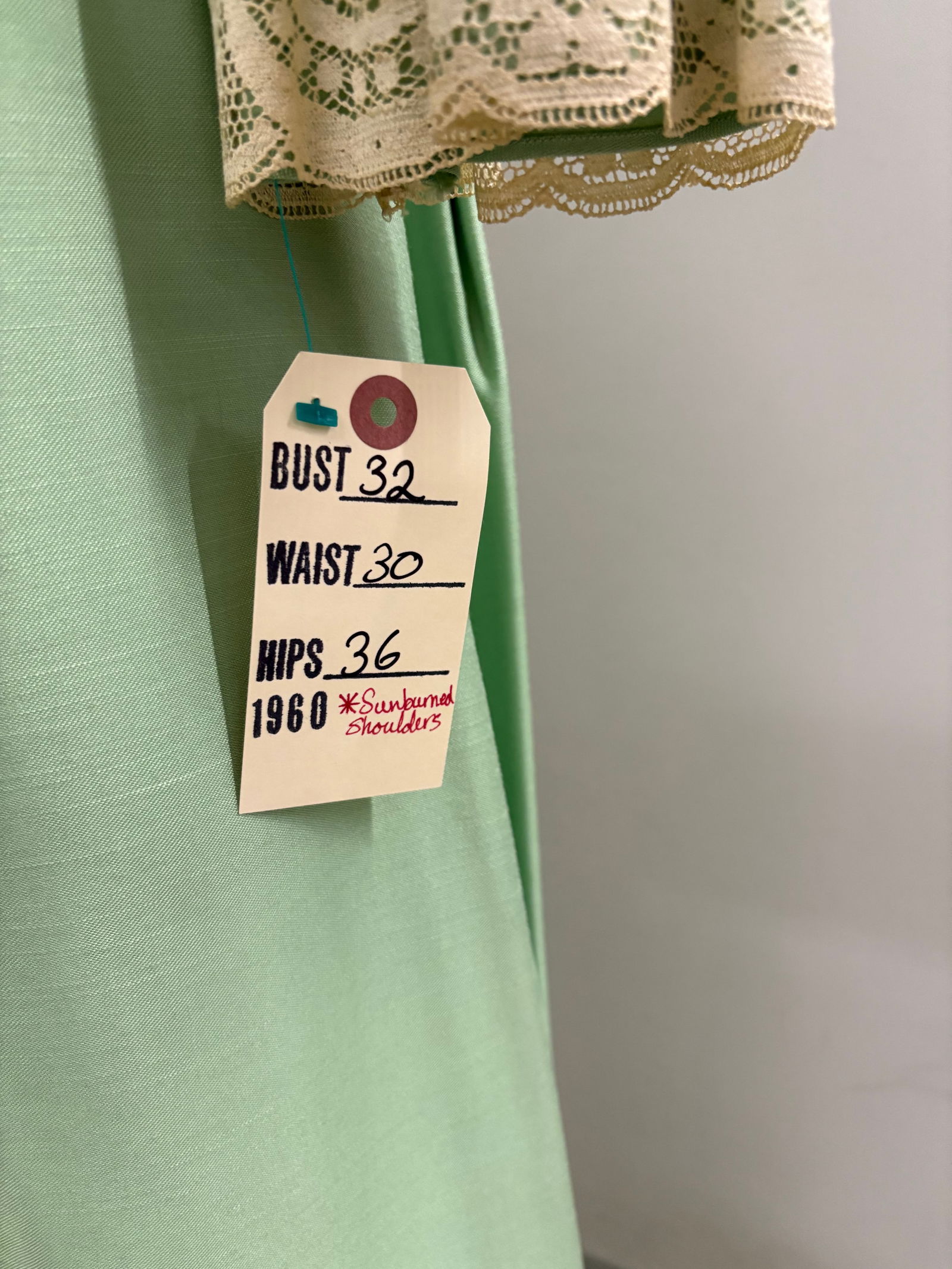 Evening gown, 1960s, mint-green, empire waist with Watteau back and cream lace sleeves, by Lorrie De: Evening gown, 1960s, mint-green, empire waist with Watteau back and cream lace sleeves, by Lorrie Deb. IMPORTANT NOTE TO BIDDERS: We are not an auction gallery but a liquidator retained by CRC as they