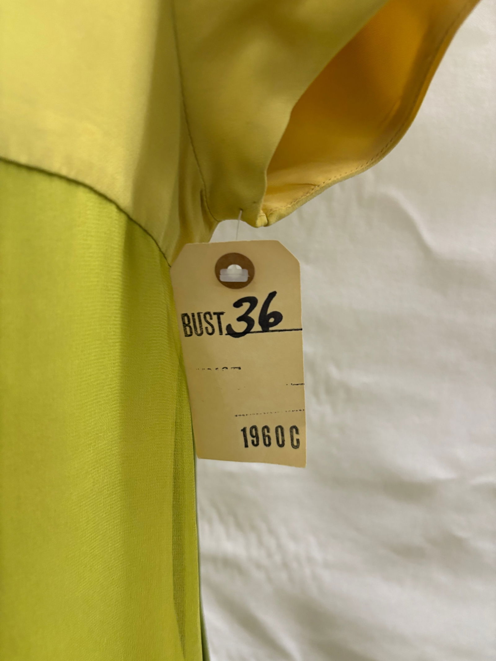 Evening gown, 1960, chartreuse silk chiffon over yellow/olive/mint back panel, by I. Magnin.: Evening gown, 1960, chartreuse silk chiffon over yellow/olive/mint back panel, by I. Magnin. IMPORTANT NOTE TO BIDDERS: We are not an auction gallery but a liquidator retained by CRC as they wind-down