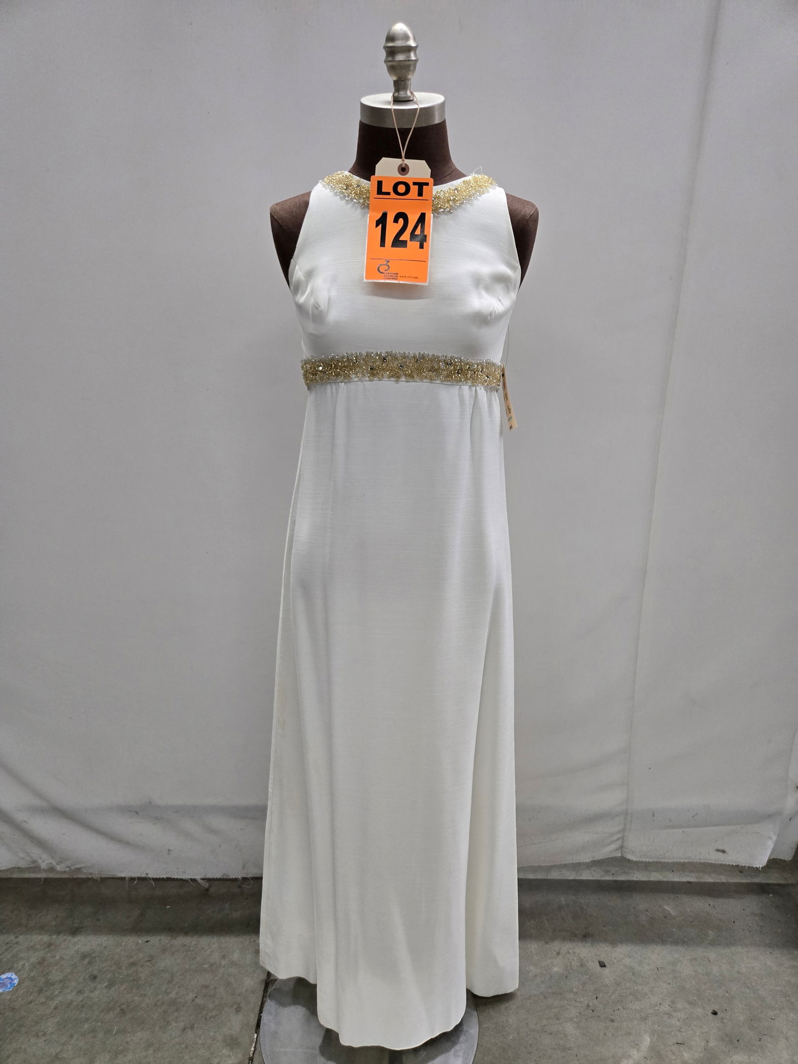 Evening gown, 1960s, white soft faille, silver/gold rhinestone beaded trim at waist/neck.: Evening gown, 1960s, white soft faille, silver/gold rhinestone beaded trim at waist/neck. IMPORTANT NOTE TO BIDDERS: We are not an auction gallery but a liquidator retained by CRC as they wind-down op