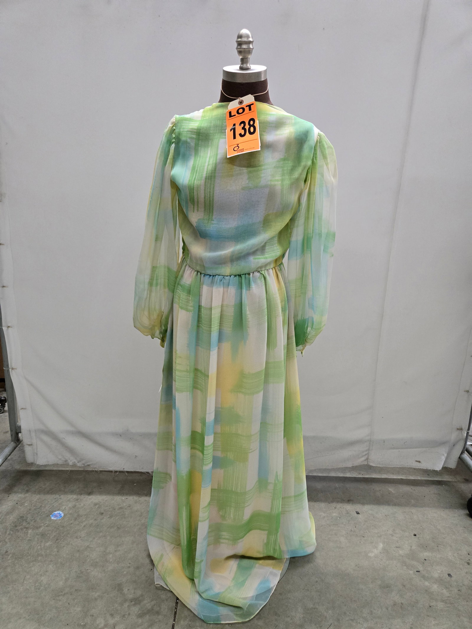 Evening gown set, 1970s, green/yellow/white/blue/pink abstract-plaid chiffon, long sleeve with self : Evening gown set, 1970s, green/yellow/white/blue/pink abstract-plaid chiffon, long sleeve with self belt. IMPORTANT NOTE TO BIDDERS: We are not an auction gallery but a liquidator retained by CRC as t