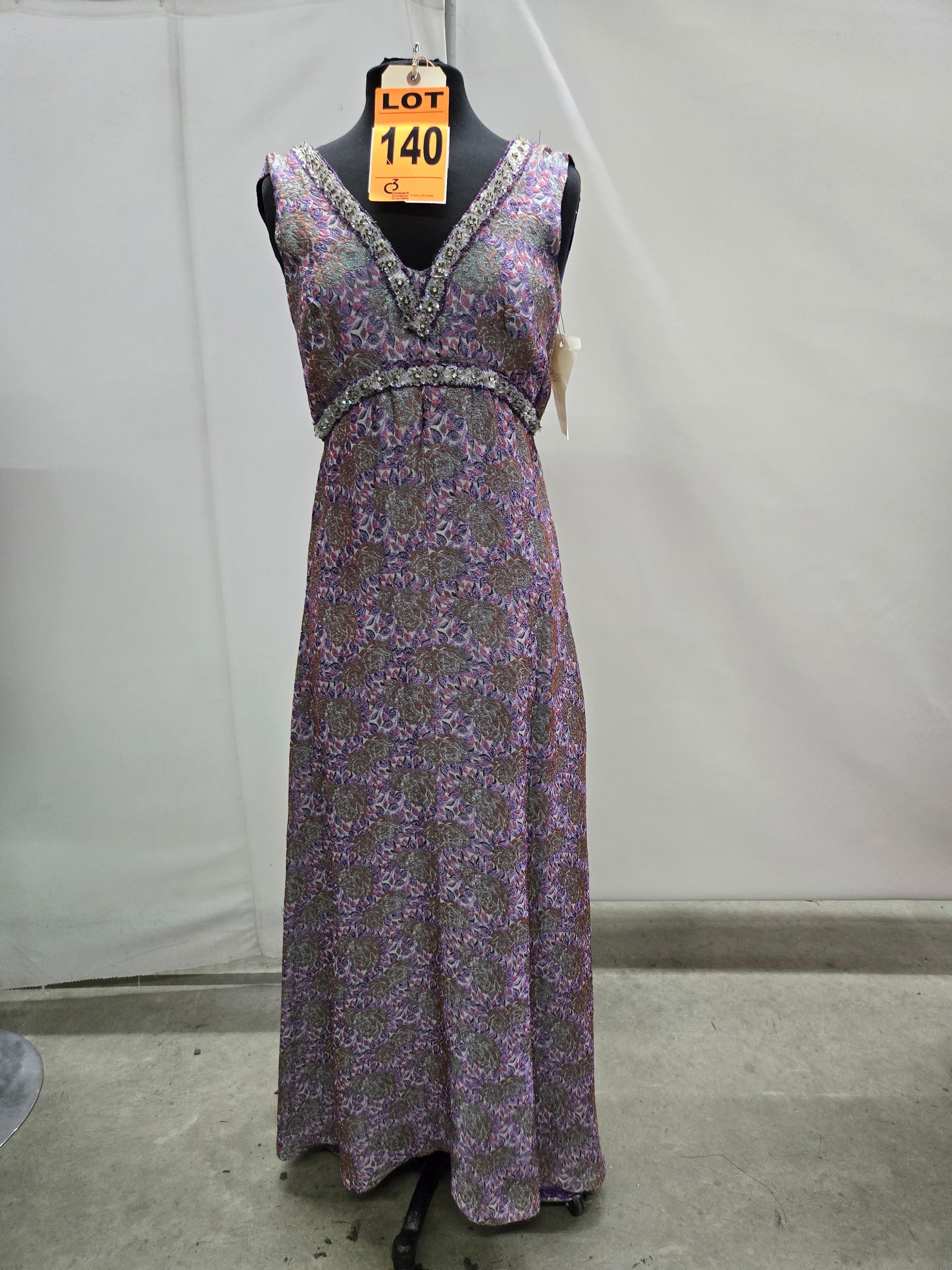 Evening gown, 1960s, purple/pink/green brick lamé floral brocade, 3-D beaded trim at waist/neck (1 of 5)