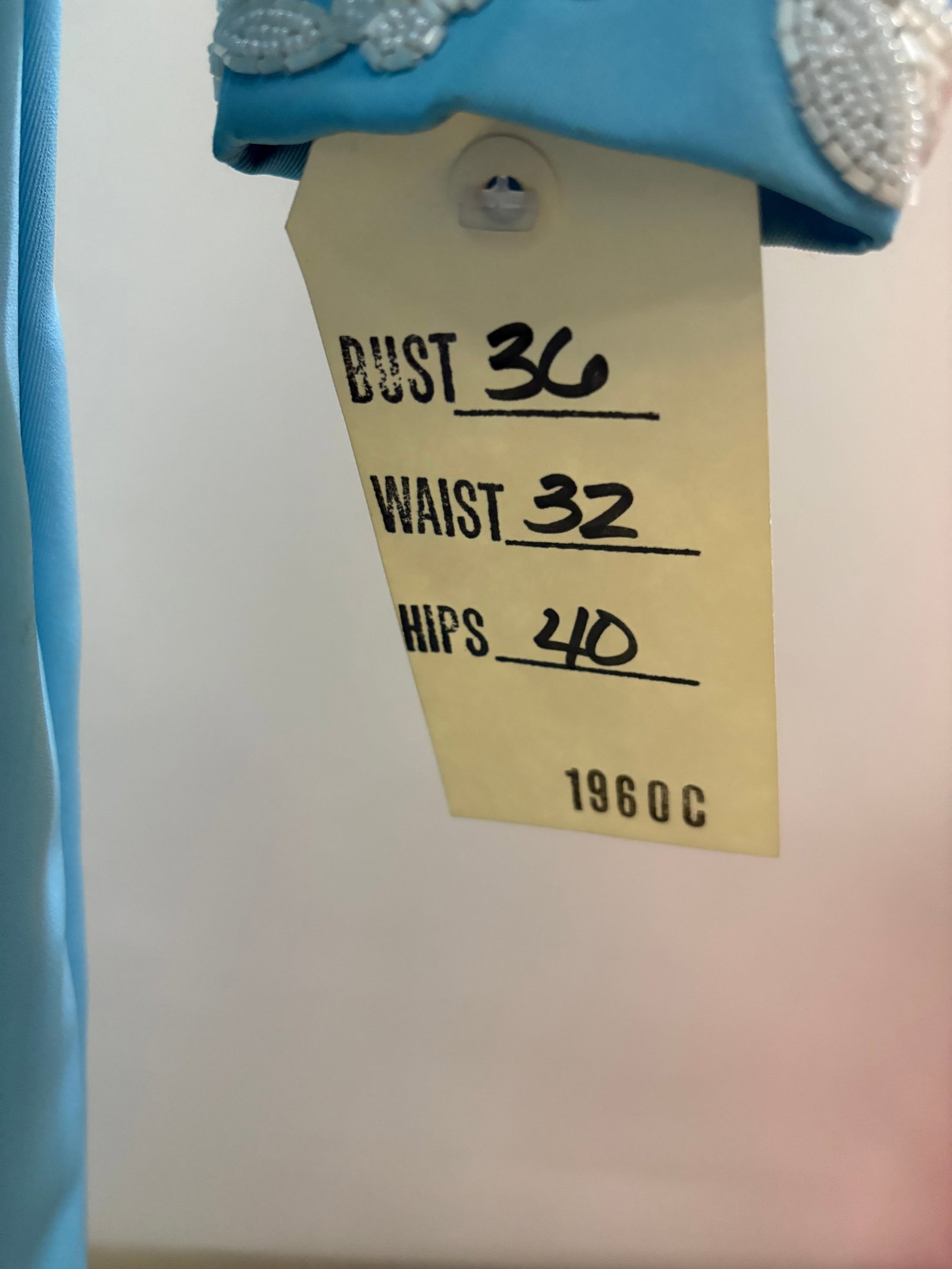 Evening gown, n/a, baby blue, 3-D white floral/leaf beaded trim at center front, cuffs and collar. (1 of 5)