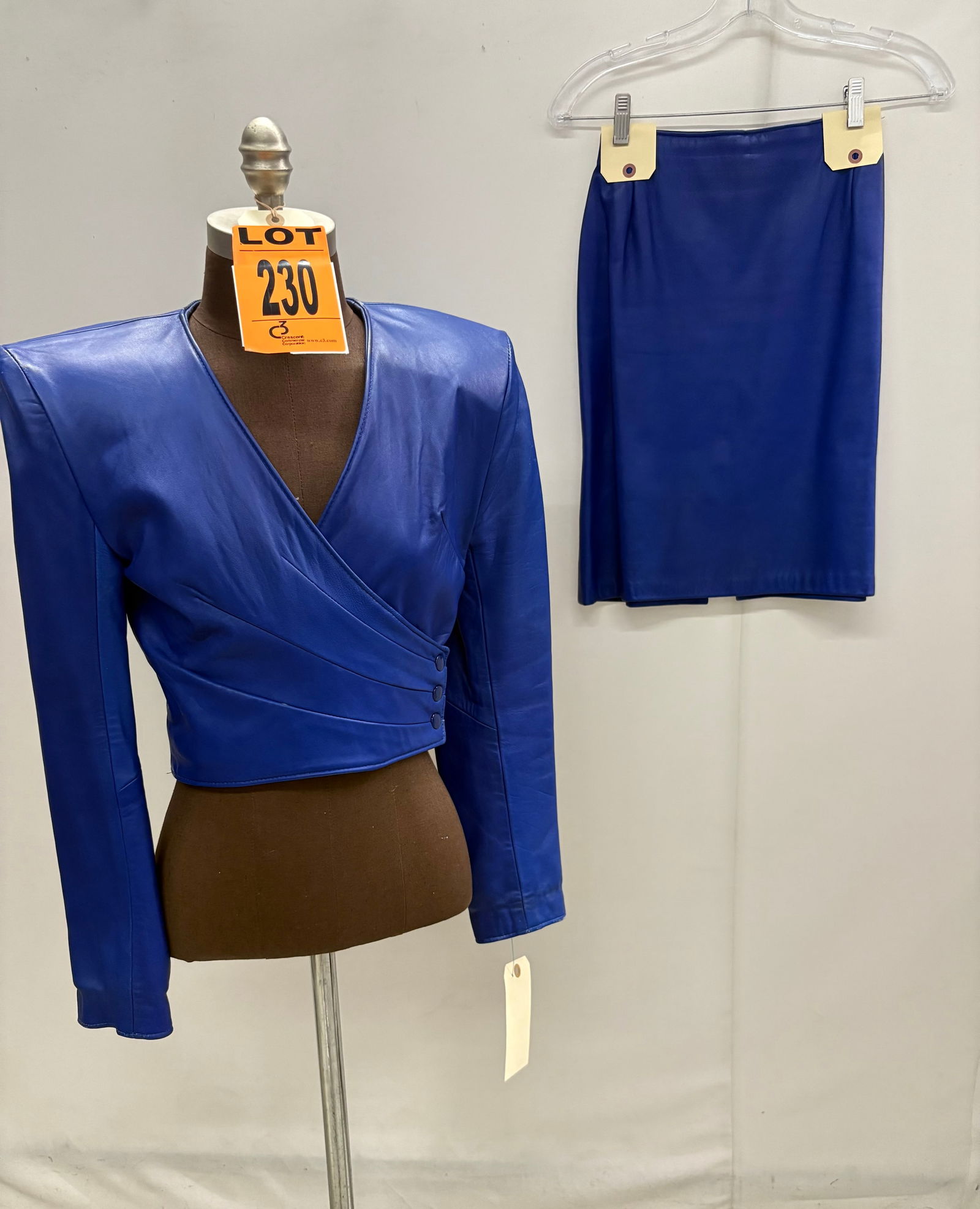Suit set, 1980s, electric-blue leather, cross-front jacket with shoulder pads and mini skirt, by Fir (1 of 10)
