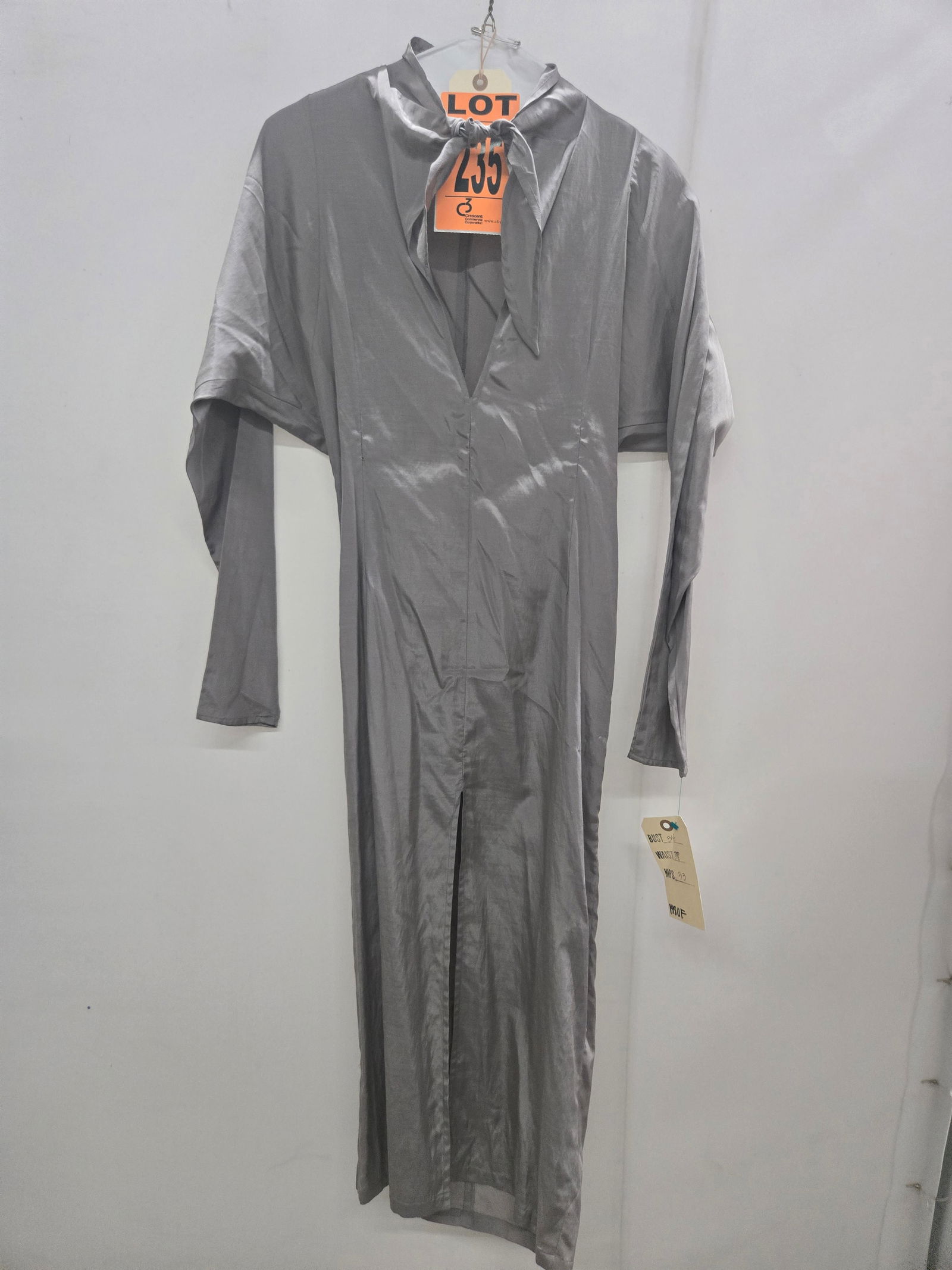 Dress, 1980s, light-grey silk, dolman sleeves with tie neck, by Parachute.: Dress, 1980s, light-grey silk, dolman sleeves with tie neck, by Parachute. IMPORTANT NOTE TO BIDDERS: We are not an auction gallery but a liquidator retained by CRC as they wind-down operations. As su