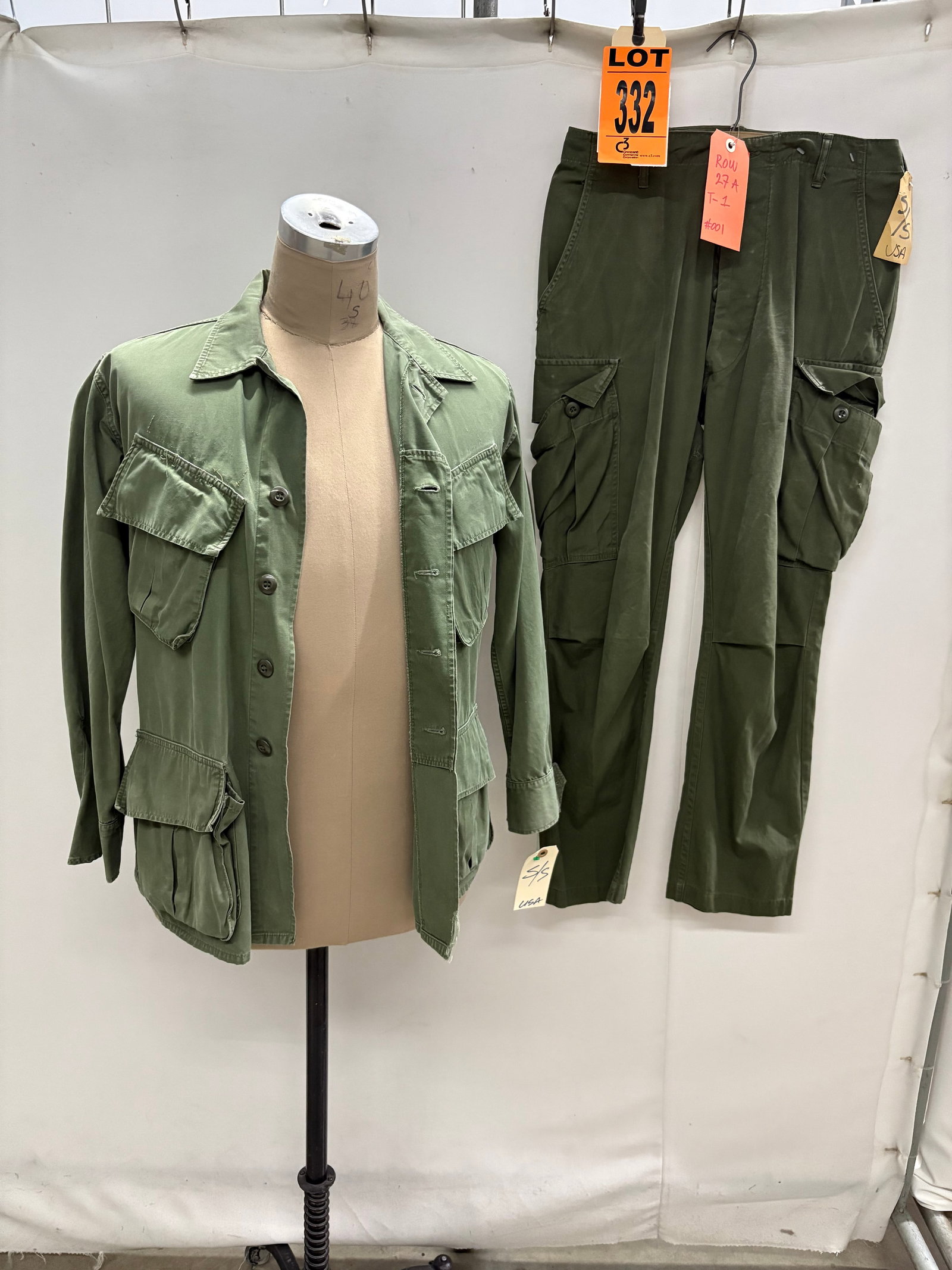 OG107 poplin jungle jacket and poplin jungle trousers circa Both pieces in sizes small short. ?: OG107 poplin jungle jacket and poplin jungle trousers circa 1967. Both pieces in sizes small short. (2 pcs). featured in Apocalypse Now (1979) Location: Row 27A, Item #1 IMPORTANT NOTE TO BIDDERS: We 