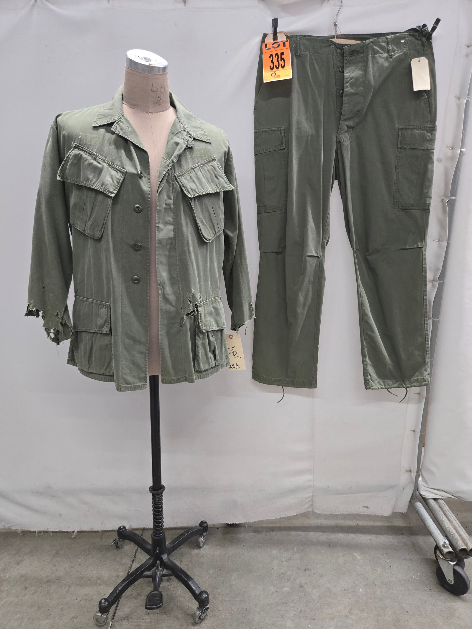 OG107 poplin jungle jacket and poplin jungle trousers circa Both pieces in sizes large regular. ?: OG107 poplin jungle jacket and poplin jungle trousers circa 1967. Both pieces in sizes large regular. (2 pcs). featured in Apocalypse Now (1979) Location: Row 27A, Item #4 IMPORTANT NOTE TO BIDDERS: W