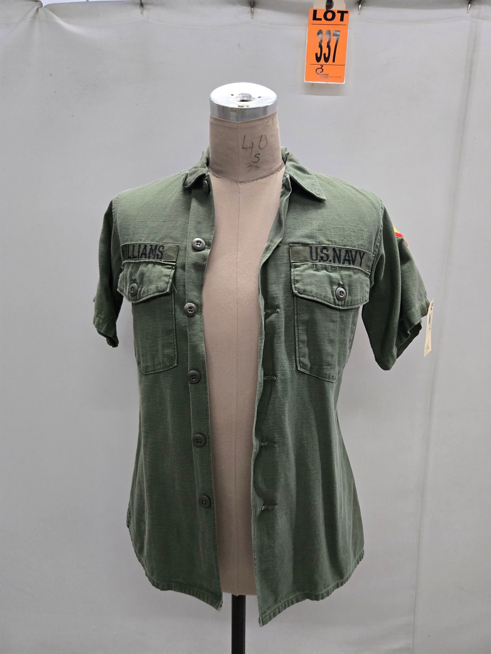 OG107 cotton sateen short sleeve shirt with US Navy tape and studio made 34th PBR Vietnamese: OG107 cotton sateen short sleeve shirt with US Navy tape and studio made 34th PBR Vietnamese shoulder patch (Brown Water Navy). Williams name tape on right breast. (1 pcs). featured in Apocalypse Now