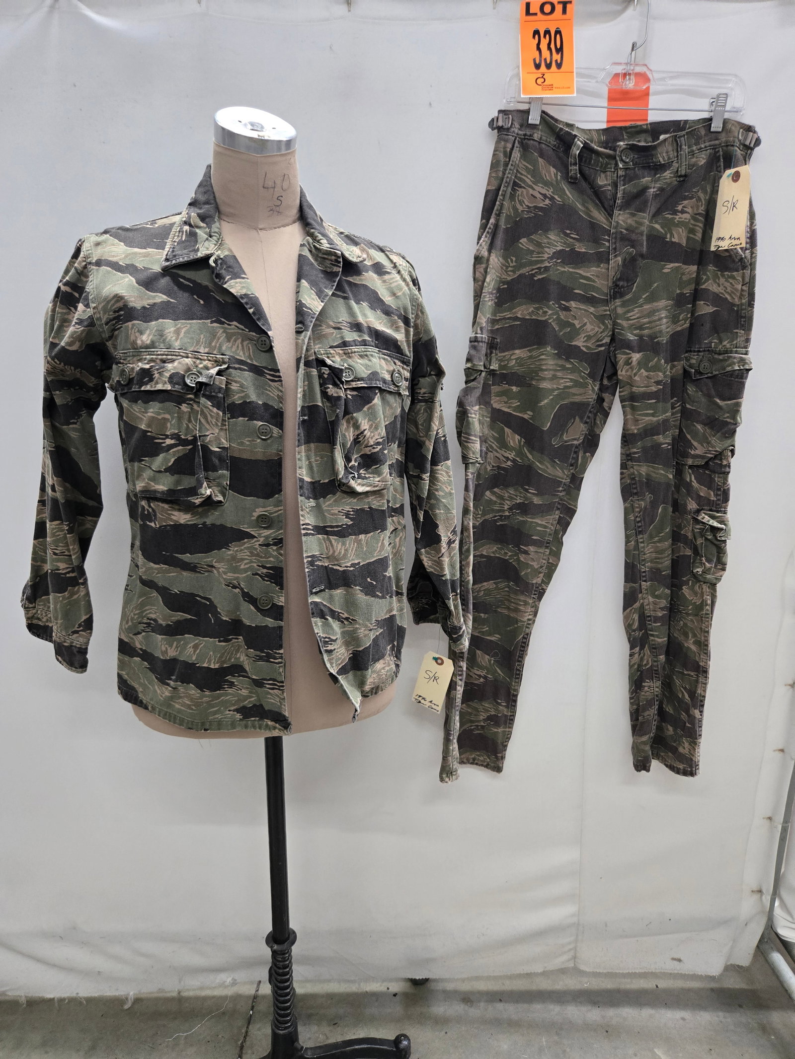 Tiger stripe set made for lead actor Ray Liotas stunt double. ? Operation Dumbo Drop: Tiger stripe set made for lead actor Ray Liotas stunt double. (2 pcs). featured in Operation Dumbo Drop (1997) Location: Row 27A, Item #8 Note that items attributable to celebrities and productions ar