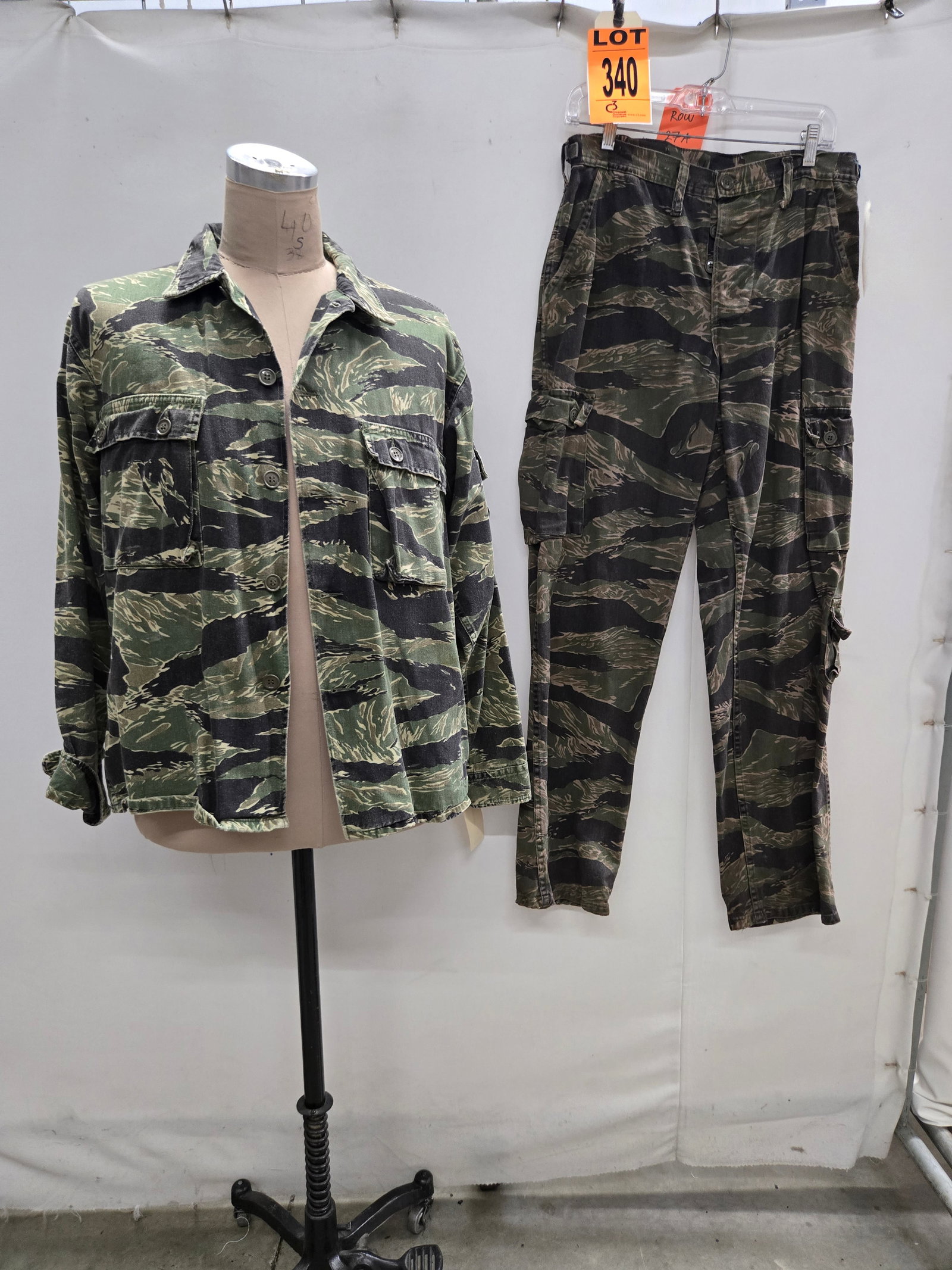 Tiger Stripe Set made for RAY LIOTTA playing Captan T.C. Doyle in Operation Dumbo Drop: Tiger stripe set made for lead actor Ray Liotta who played Captan T.C. Doyle. (2 pcs). worn by Ray Liotta, featured in Operation Dumbo Drop (1997) Location: Row 27A, Item #9 Note that items attributab