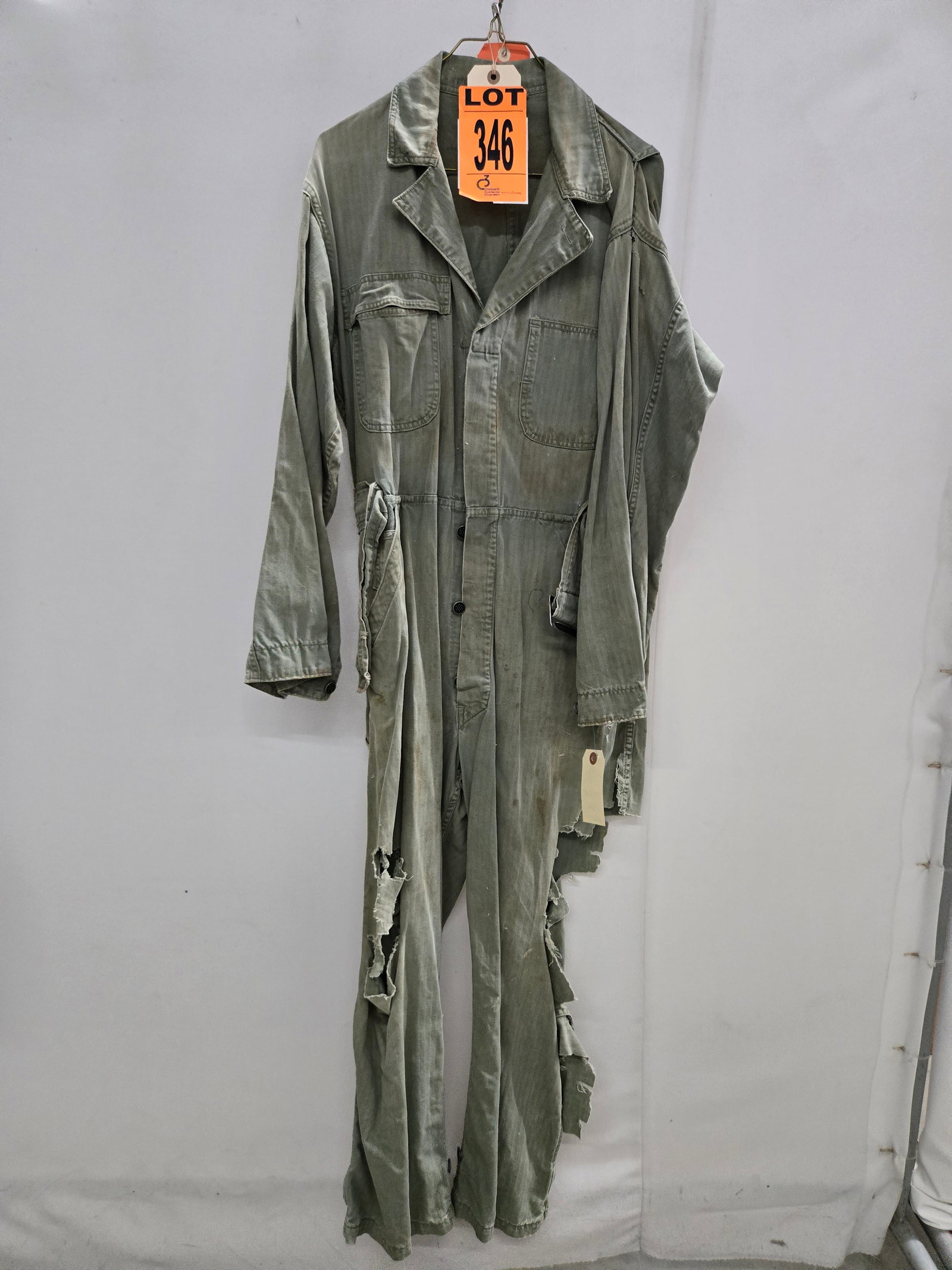 Army air corps hbt mechanics coveralls. Original wwii manufacture. Heavily distressed for ford: Army air corps hbt mechanics coveralls. Original wwii manufacture. Heavily distressed for ford island attack sequence. (1 pcs). featured in Pearl Harbor (2001) Location: Row 28A, Item #5 IMPORTANT NOT