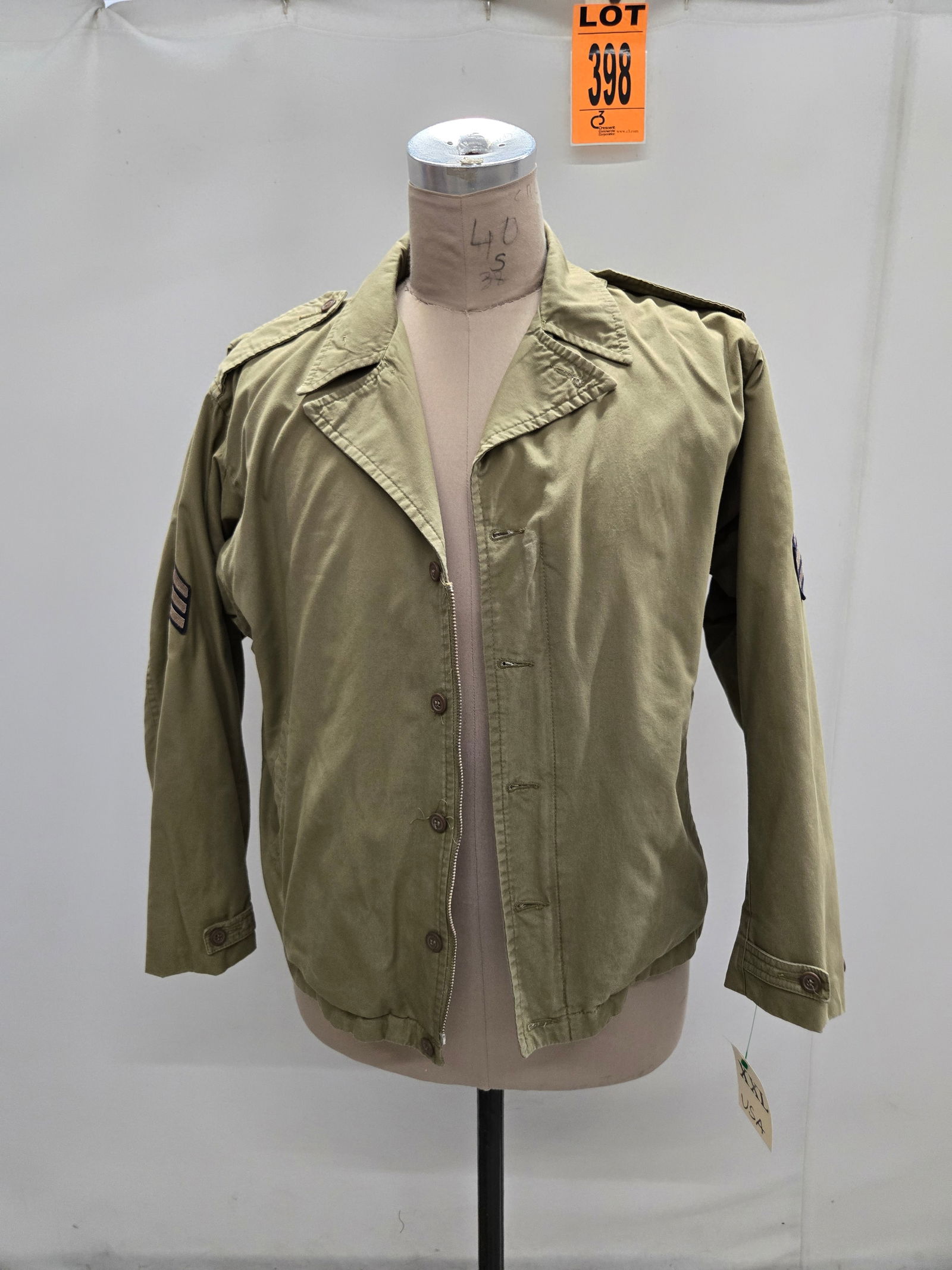Reproduction m41 Field Jacket with 1st infantry shoulder patch and sergeants chevrons. Featured in (1 of 8)