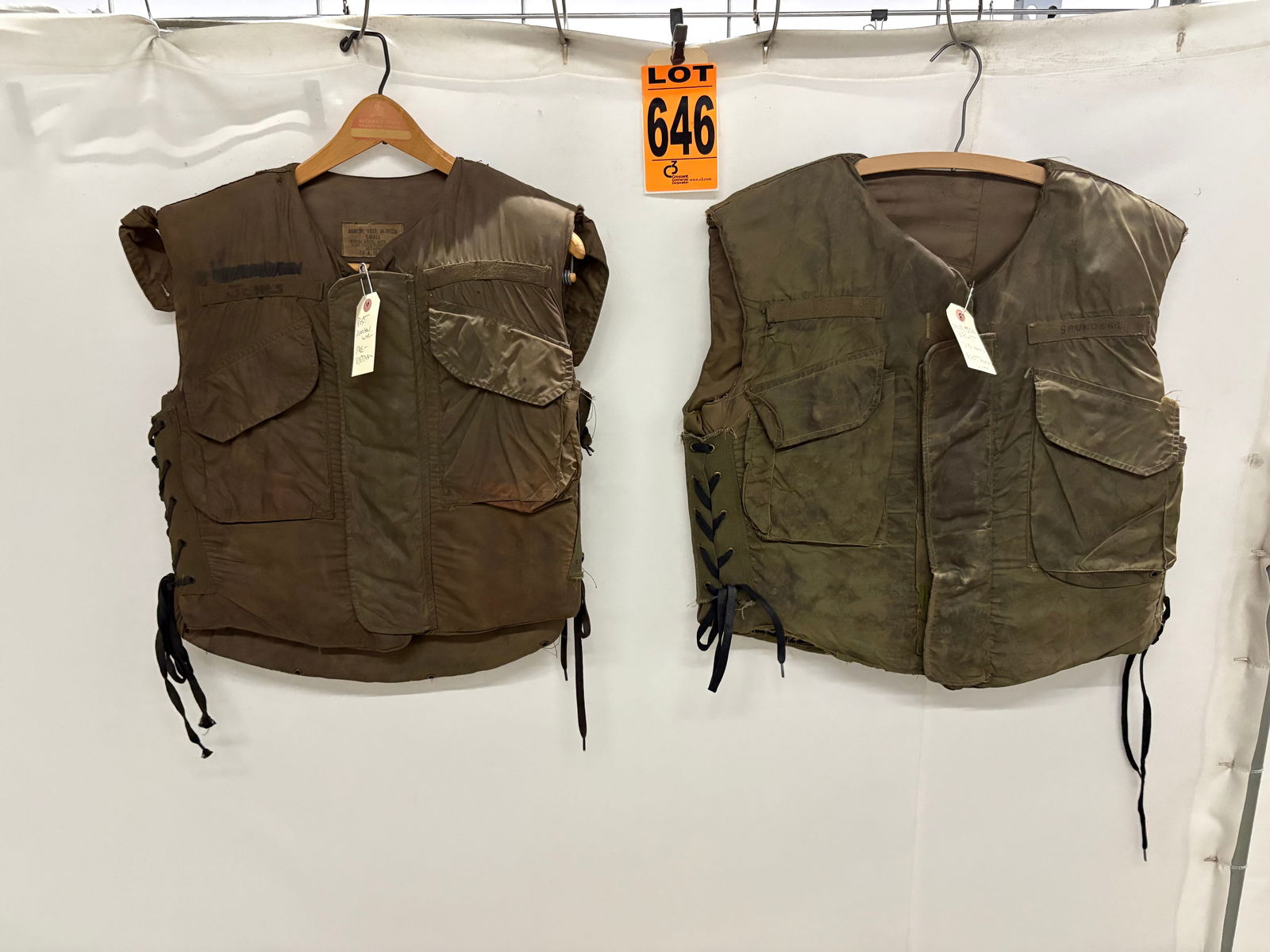 Lot of (2) U.S.A.F Vest's, name patches read "JONES" and "SAUNDERS". I.d tag "Post-Korean War", (1 of 7)