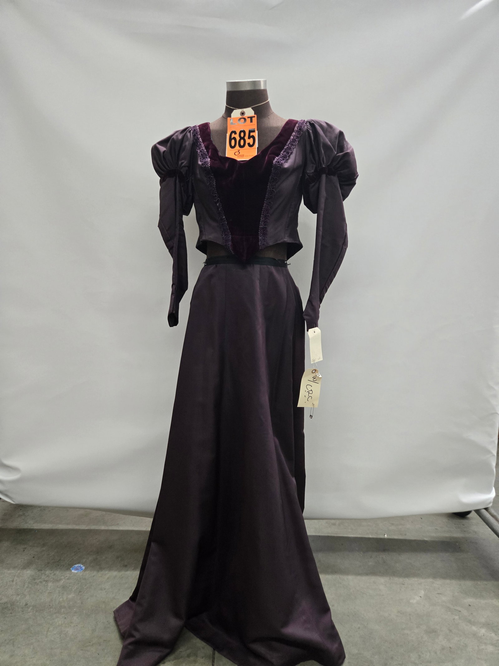 2pc 1890's Period Costume, high neckline and full skirt, tag reads "Angela Lansbury": 1890's Period Costume, high neckline and full skirt, tag reads "Angela Lansbury" IMPORTANT NOTE TO BIDDERS: We are not an auction gallery but a liquidator retained by CRC as they wind-down operations.