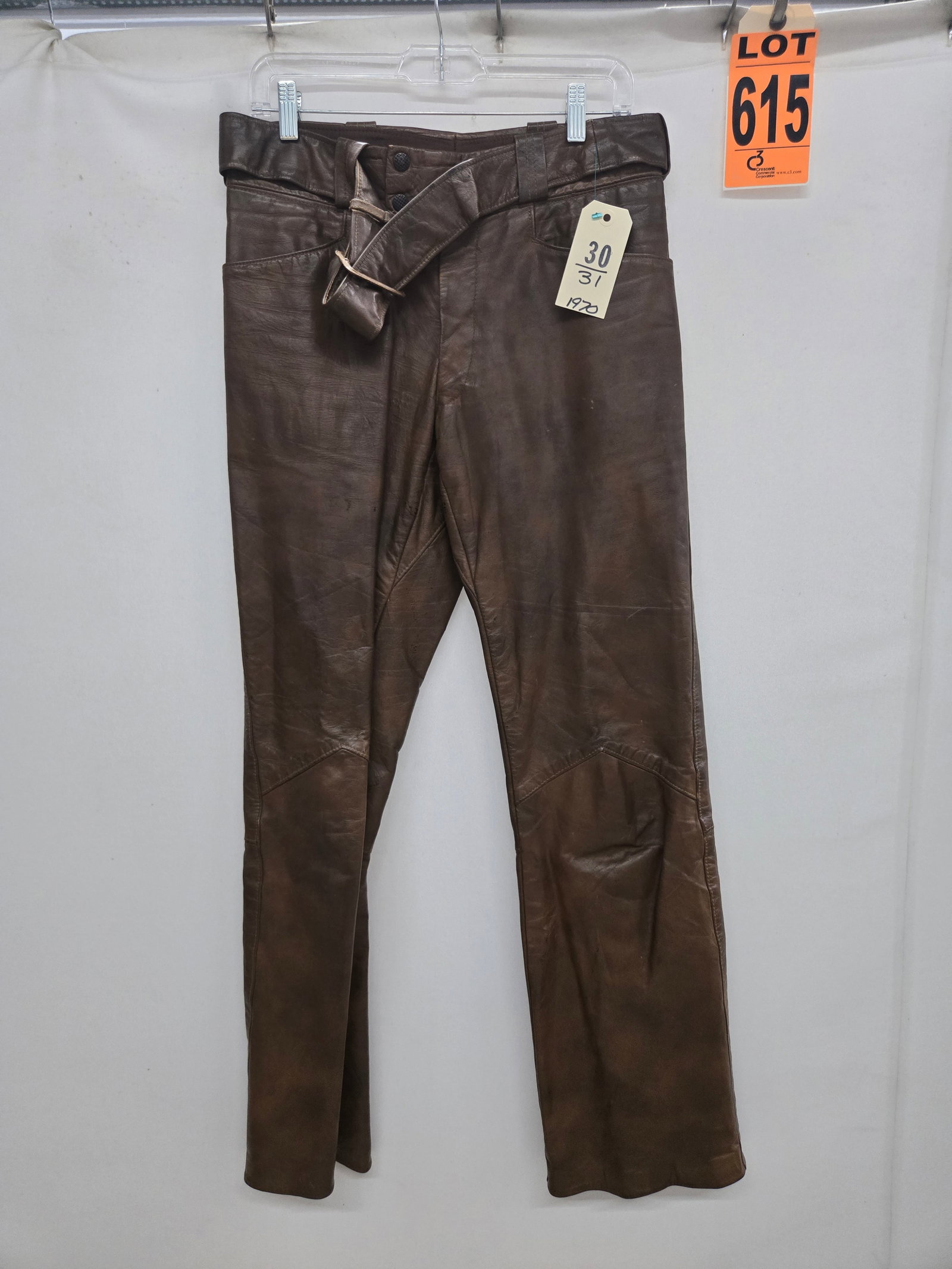Pants, 2-piece 1970s brown leather with self-belt: Pants, 2-piece 1970s brown leather with self-belt IMPORTANT NOTE TO BIDDERS: We are not an auction gallery but a liquidator retained by CRC as they wind-down operations. As such, we cannot offer the s