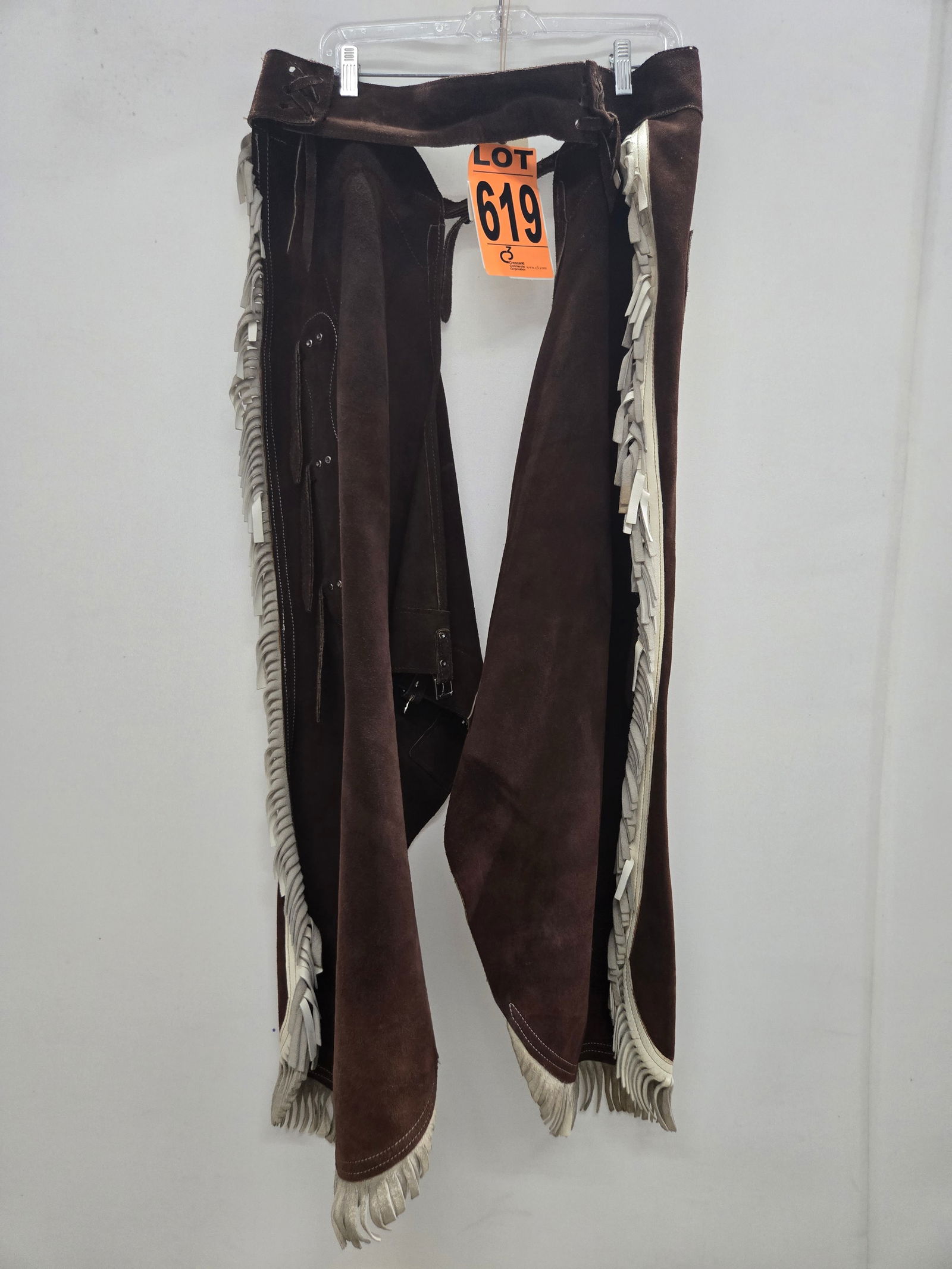 Western chaps, dark brown suede with off-white leather trim, fringe, and buckles (1 of 6)