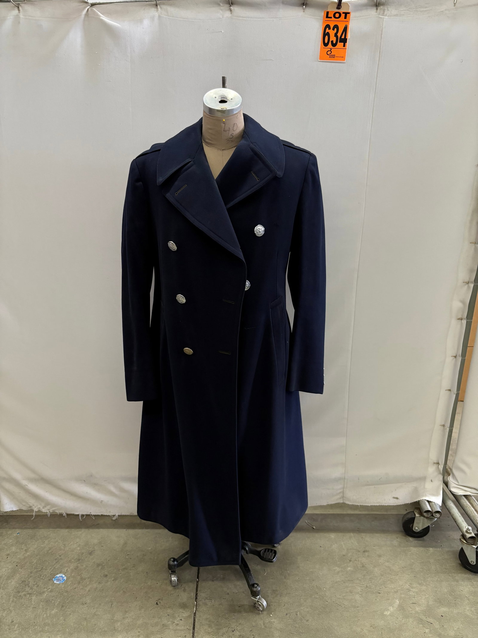 NYPD Wool overcoat: NYPD Wool overcoat IMPORTANT NOTE TO BIDDERS: We are not an auction gallery but a liquidator retained by CRC as they wind-down operations. As such, we cannot offer the same time allowances for payment