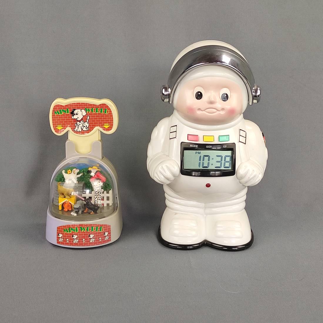 Convolute two piggy banks with function, consisting of: "Computer-Spar-Astr (1 of 5)