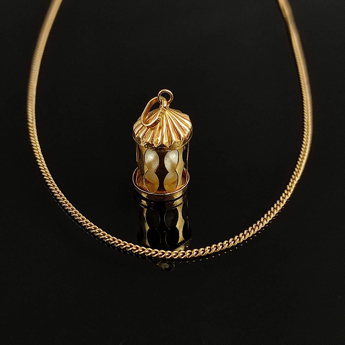 Unusual pendant on a chain, 585/14K yellow gold, small cage, inside a pearl: Unusual pendant on a chain, 585/14K yellow gold, small cage, inside a pearl, size 20x9mm, 2g, on anchor chain with spring ring clasp (slightly bent), sterling silver, gold plated, length 43cm *837/01