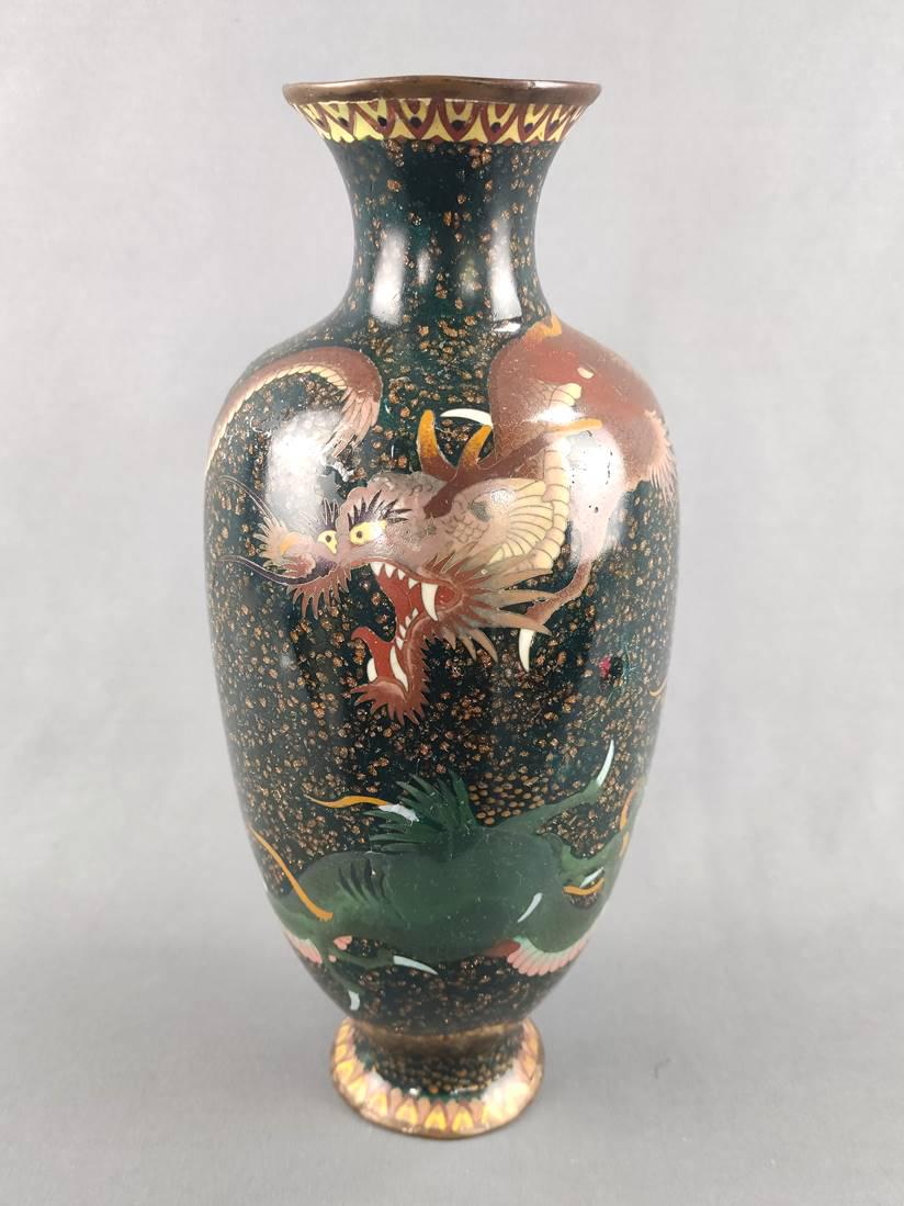 CloisonnÃ© vase, China, 19th/20th century, black base with bronze-coloured m: CloisonnÃ© vase, China, 19th/20th century, black base with bronze-coloured mica particles, decorated with two dragons, one red the other green, height 32cm, some minimal chipping *488-06 (internal)