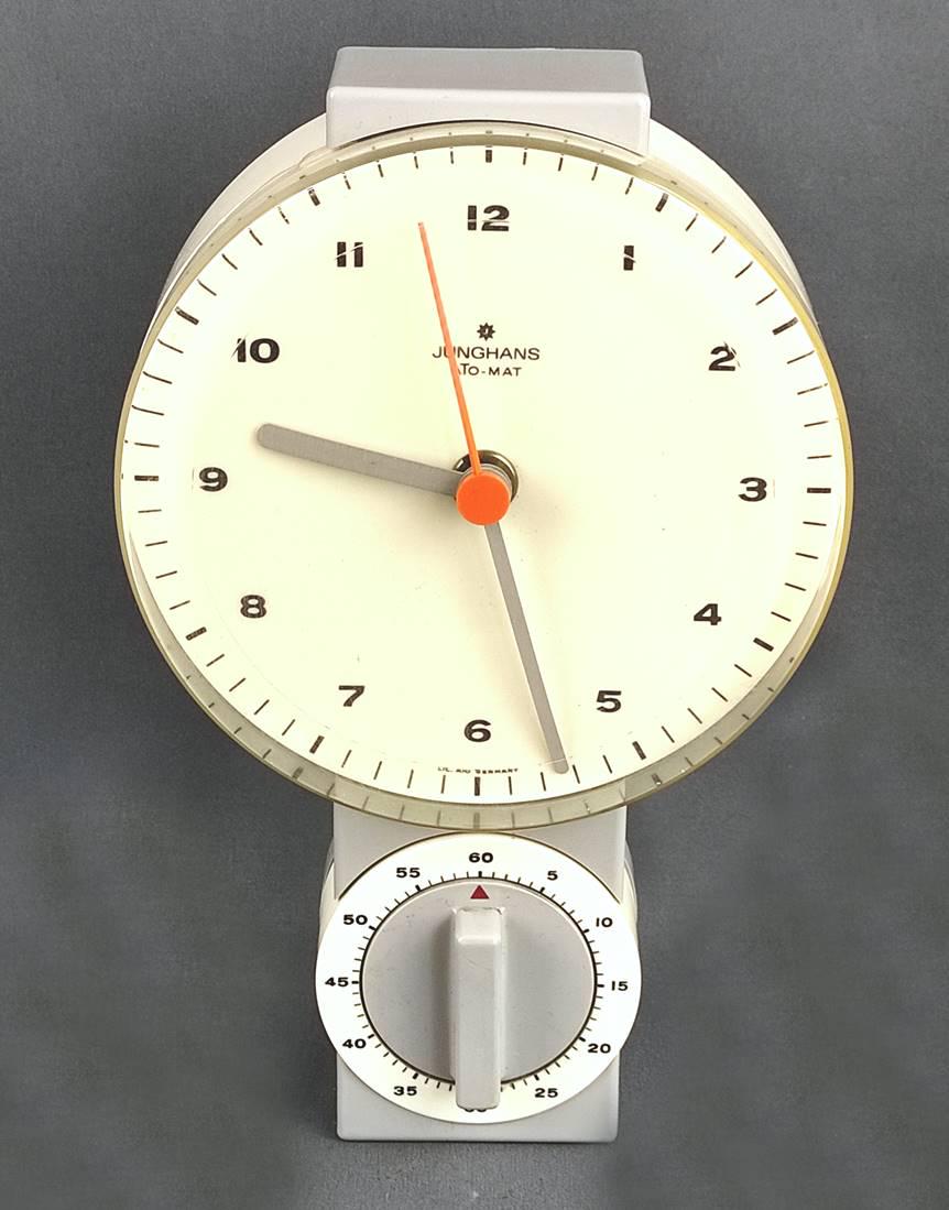 Junghans Ato-Mat kitchen clock "331/9001", design by Udo Schultheiss 1964/6: Junghans Ato-Mat kitchen clock "331/9001", design by Udo Schultheiss 1964/65, wall clock with dial and removable short timer/egg timer, this can be attached to its back by a magnet and stops time inte