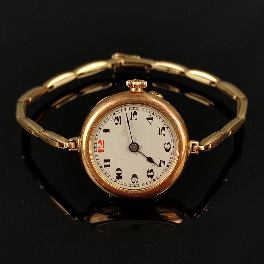Wristwatch, 585/14K (hallmarked), total weight 18.3g, round dial with Arabic numerals, diameter 28mm: Wristwatch, 585/14K (hallmarked), total weight 18.3g, round dial with Arabic numerals, diameter 28mm (with crown), fine link bracelet with pin buckle and safety eyelet, length 16.5cm, does not start.