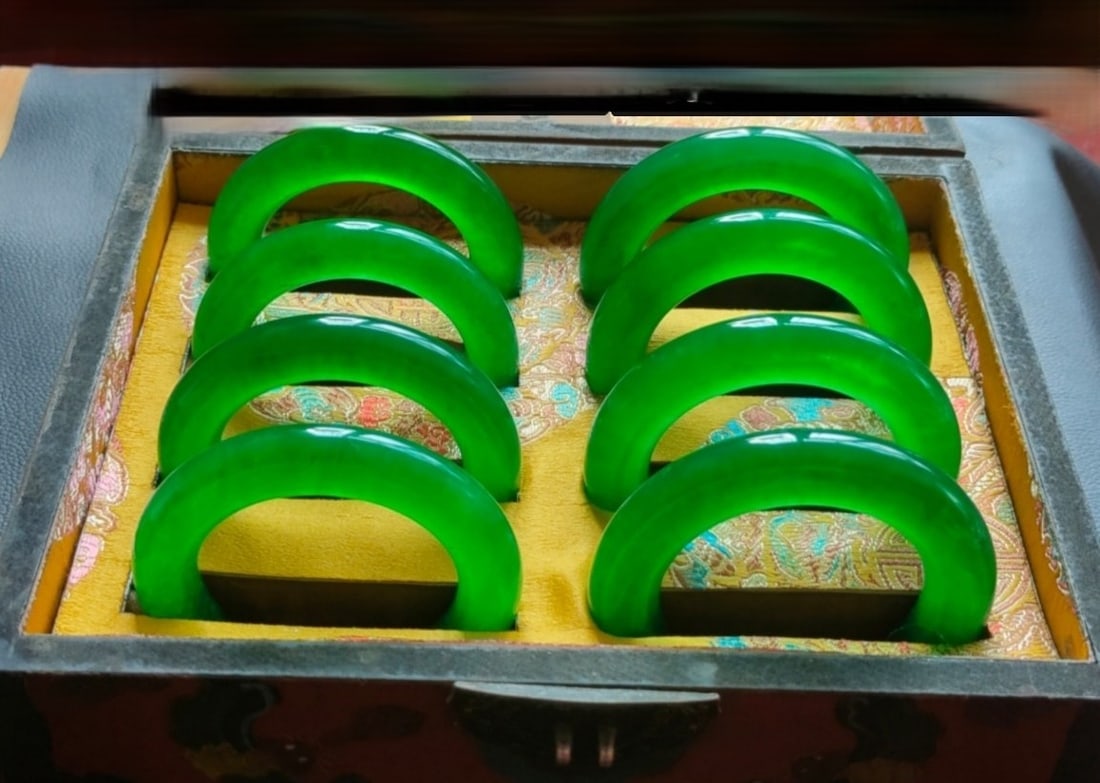 Top-grade icy imperial green jadeite bangle in a nanmu wood box with gold trim (1 of 9)