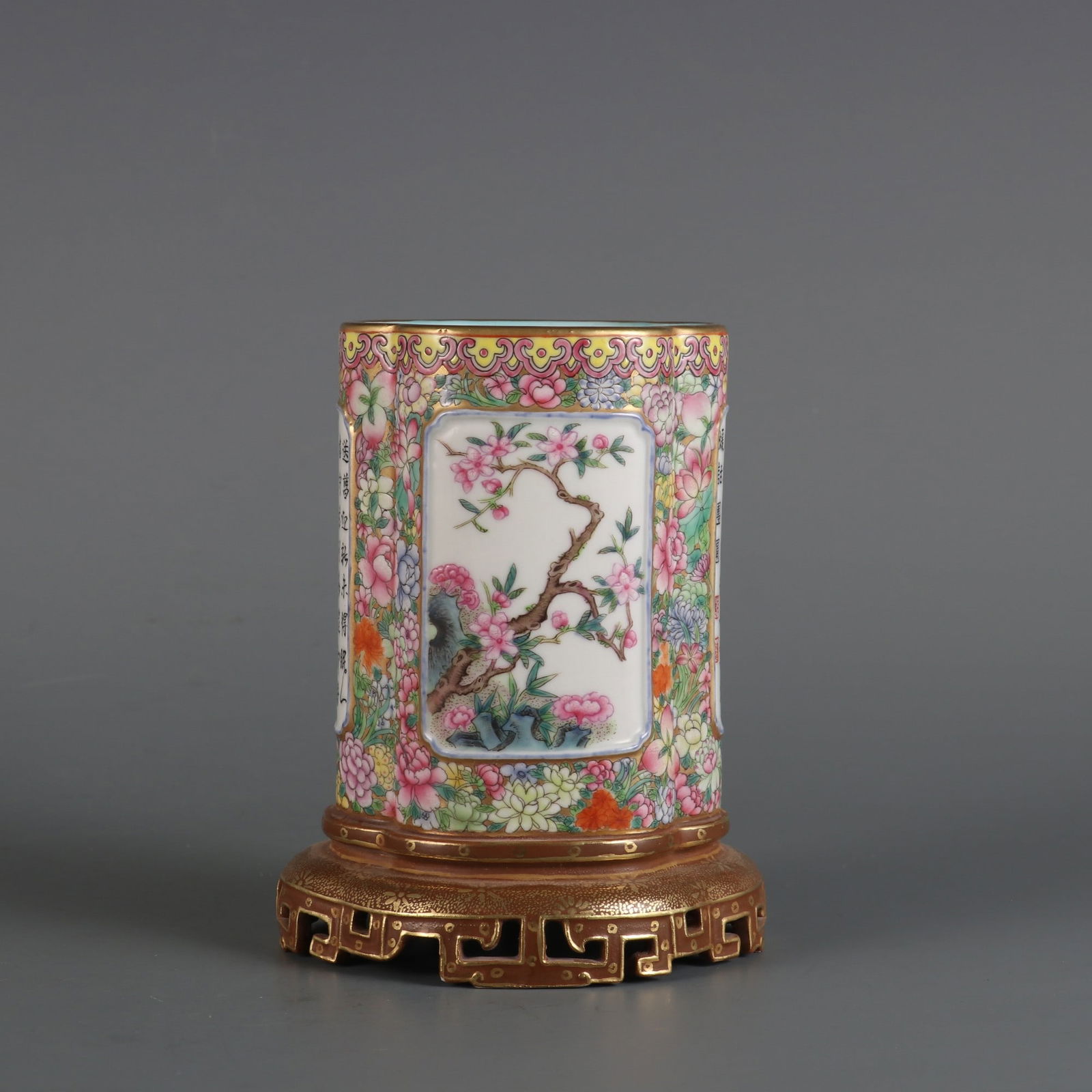 A Qing Dynasty Qianlong Period Famille Rose Flower Pattern Pen Holder with a Window and Poems (1 of 9)