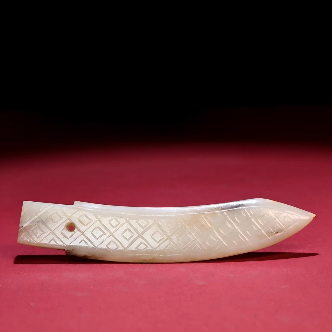 Hotan Jade Weiqin Jade Knife: Exquisite antique, Hetian jade knife with slight patina. Dimensions: 122 x 22 x 6 mm, Weight: 37 g Provenance:Private collection from a professor in Yale University. Our dedicated team expertly handle