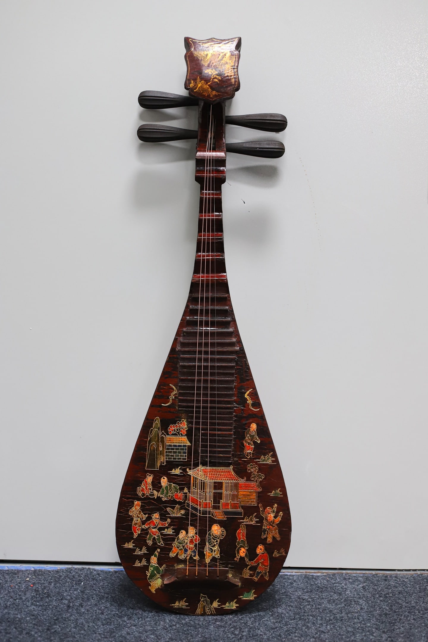 A lacquered wooden pipa (a traditional Chinese stringed instrument) with painted decoration.: A lacquered, painted pipa (a traditional Chinese stringed instrument) with a wooden base, 86 cm long, 28.5 cm wide, and 9 cm thick. Provenance:Private collection, Middletown, Rhode Island. Our dedicat