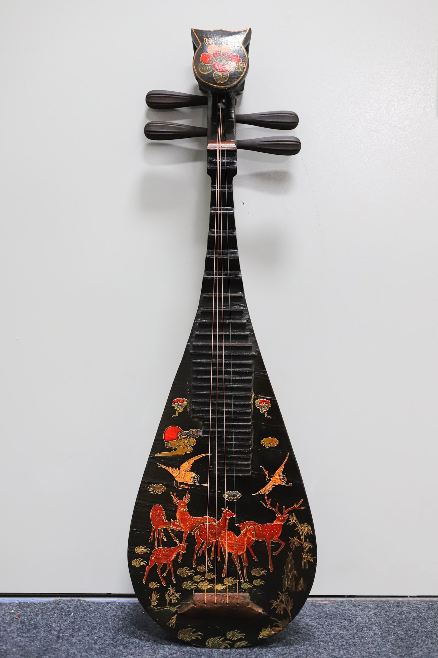 A lacquered wooden pipa (a traditional Chinese stringed instrument) with painted decoration.: A lacquered, painted pipa (a traditional Chinese stringed instrument) with a wooden base, 86 cm long, 28.5 cm wide, and 9 cm thick. Provenance:Private collection, Middletown, Rhode Island. Our dedicat