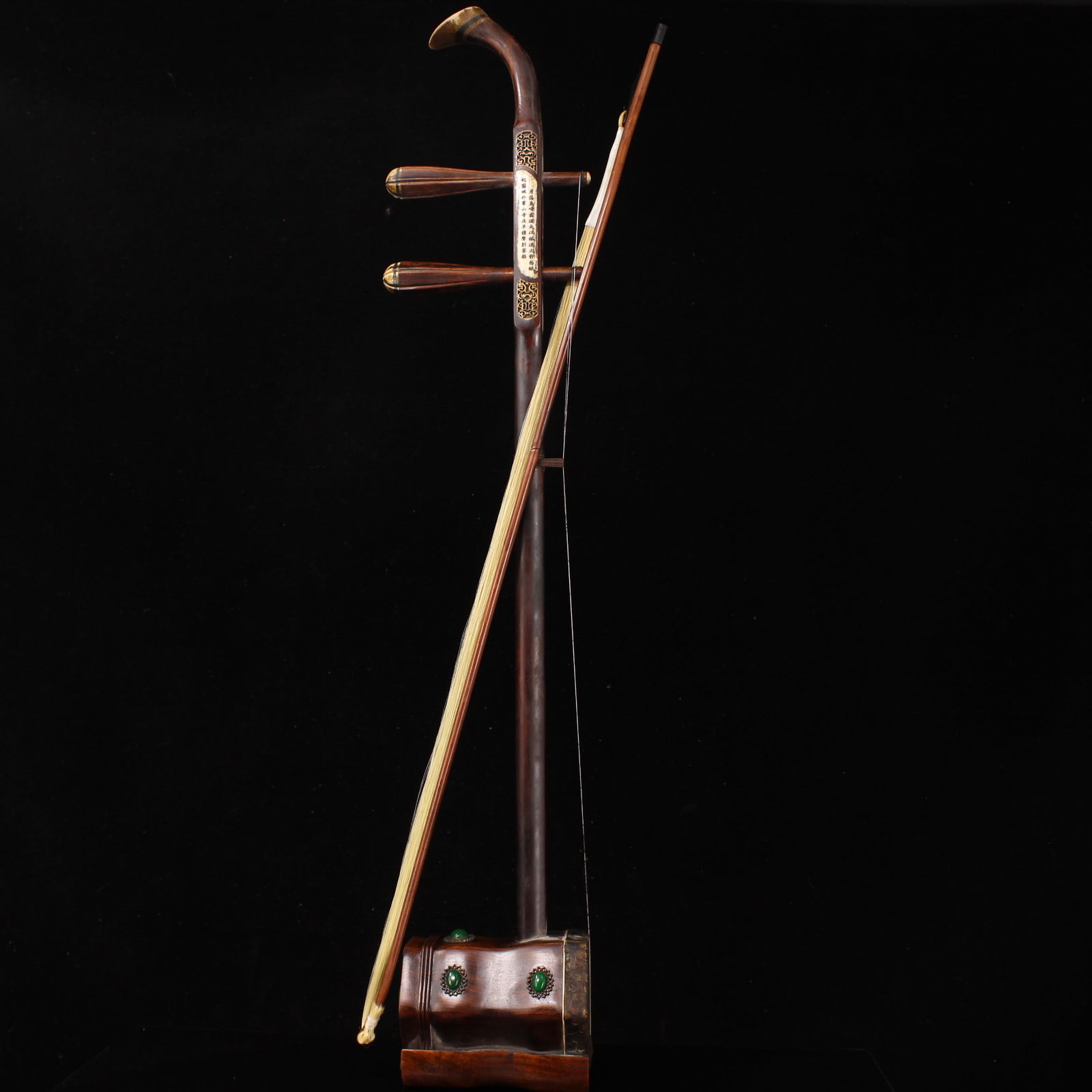 A rare antique erhu made of rosewood, hand-carved and inlaid with gemstones and bone.: A rare antique erhu (a two-stringed bowed instrument) made of pure rosewood, hand-carved, inlaid with gemstones and bone. It weighs 851 grams, is 82 cm high, and 13 cm wide. Provenance:Private collect