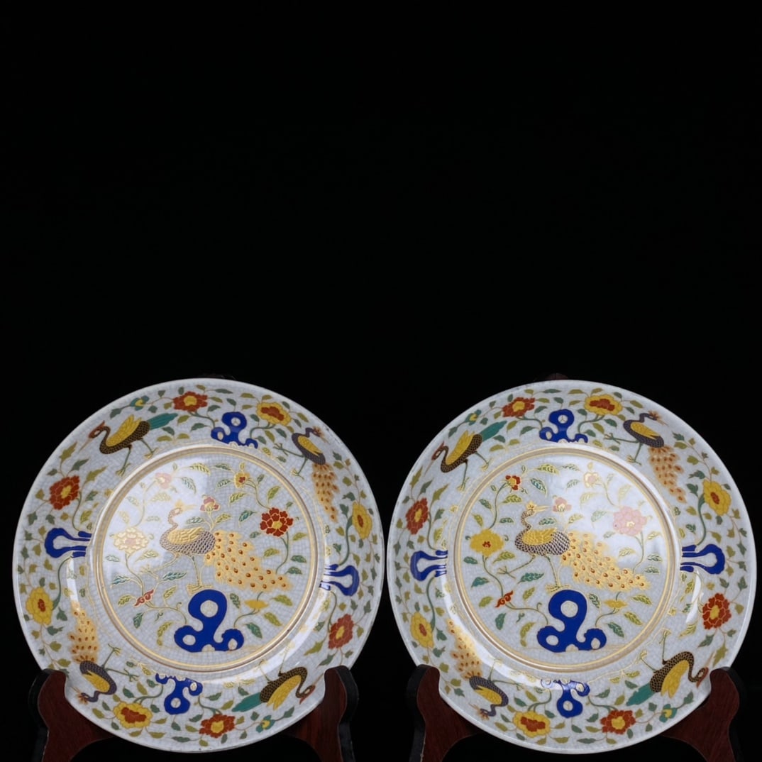 A pair of Ming Dynasty Chenghua doucai gilt-painted peacock and floral scroll pattern plates (1 of 9)