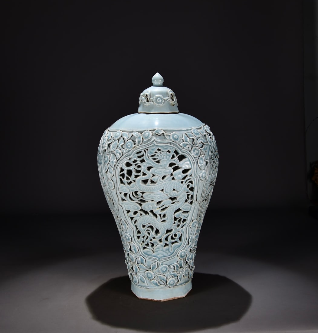Formerly in the collection, a Ming dynasty celadon openwork dragon and phoenix octagonal plum vase: Dimensions: Height 48cm, Width 27cm Provenance:Private collection from a professor in University of Pennsylvania. Our dedicated team expertly handles both domestic and global shipping arrangements.We