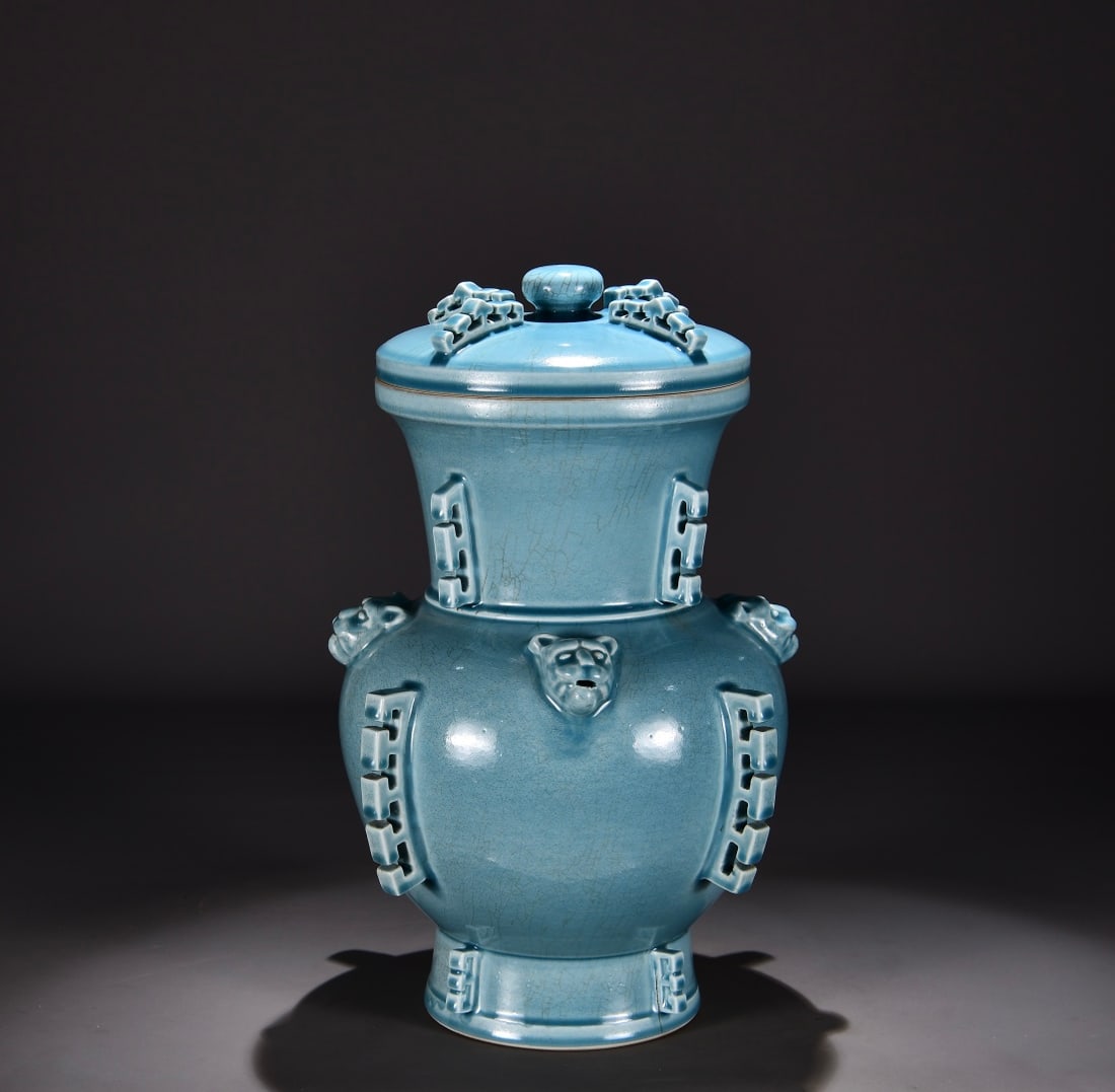 Formerly in the collection of a Qing Dynasty Qianlong period celadon vase with protruding flanges,: Dimensions: Height 48cm, Width 32cm Provenance:Private collection, Houston, Texas. Our dedicated team expertly handles both domestic and global shipping arrangements.We accept wire transfer and credit