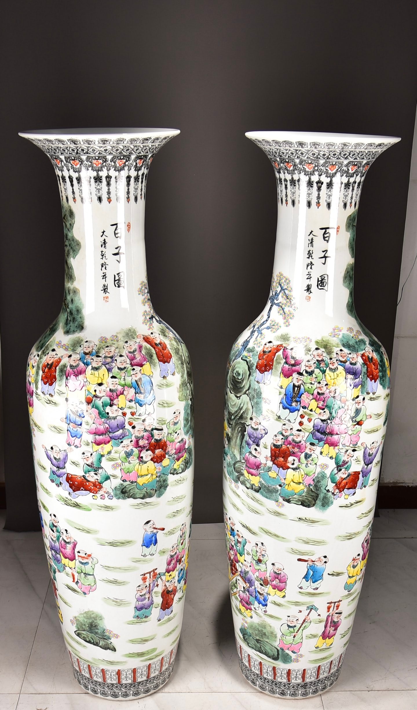 A pair of large famille rose vases with a design of one hundred children from the Qianlong period of (1 of 8)